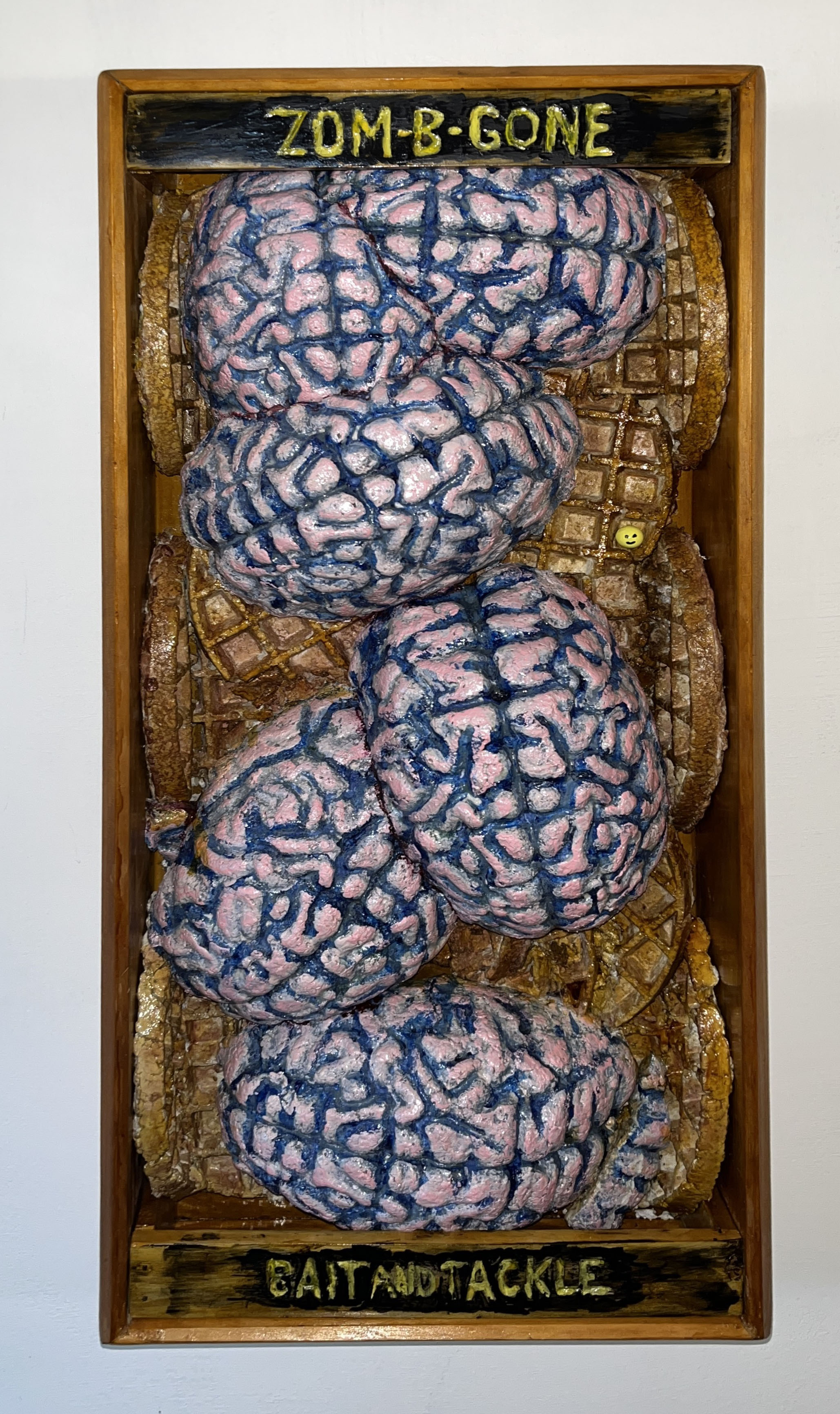 "Zom-B-Gone Bait and Tackle" 2025, Sculpture, Wood, Papier-Mâché, 25” x 11.5” x 3.5”