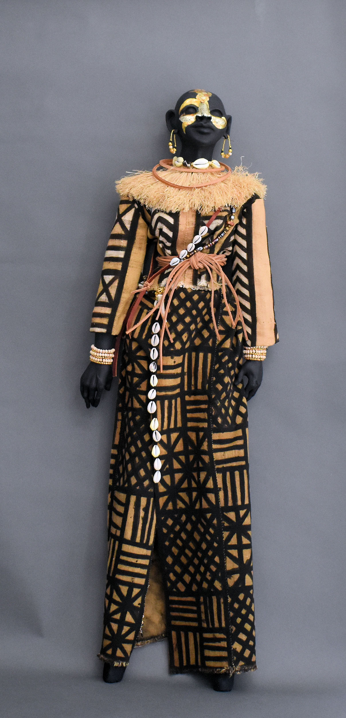 Orin Ife | 2025, paper clay, goldleaf, mudcloth, leather, deer horn, glass and wooden beads, velvet, 44 inches H