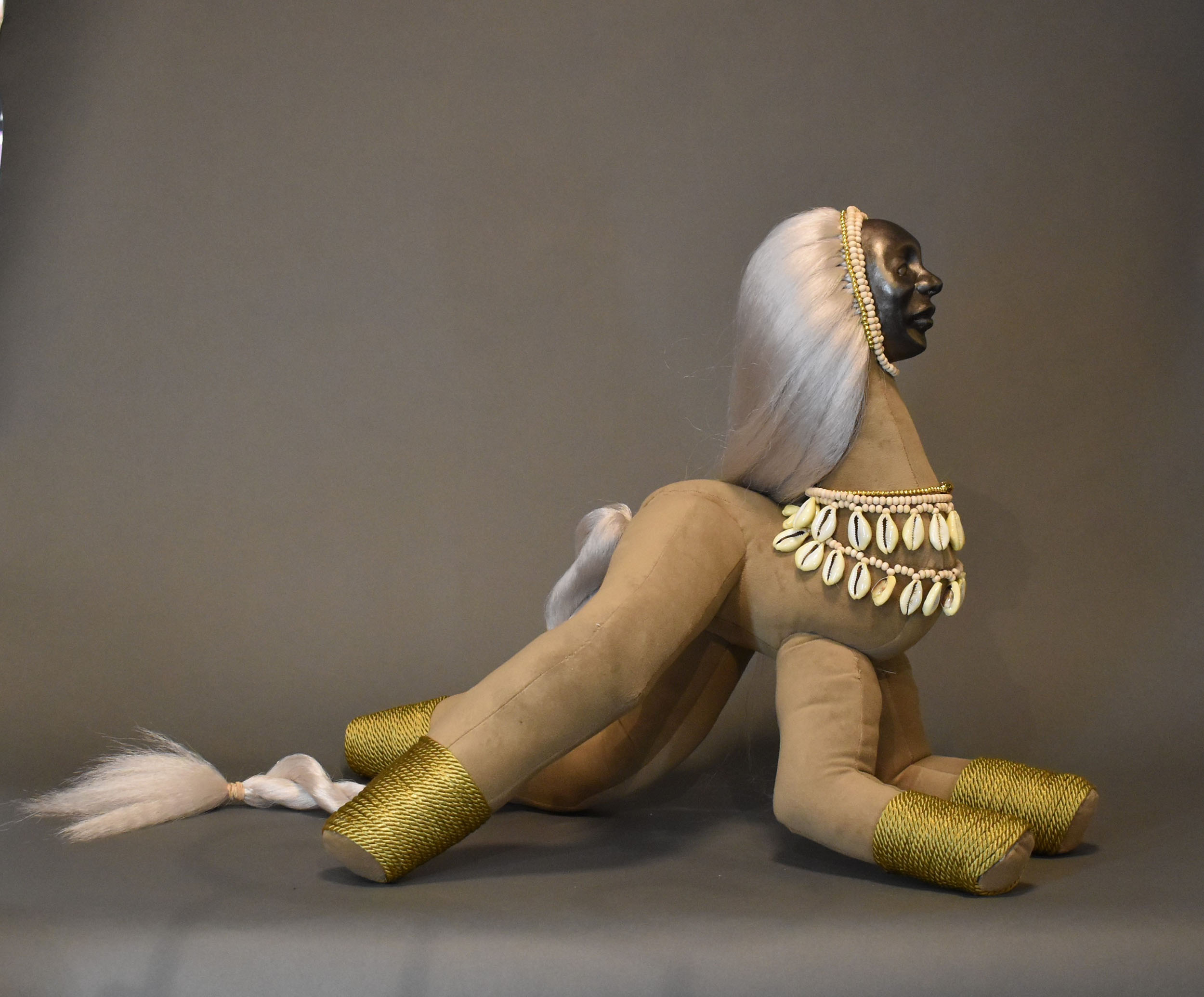 Hatshepsut’s Horse | 2023, porcelain, cowries, synthetic fiber, 22 H x 28 inches W