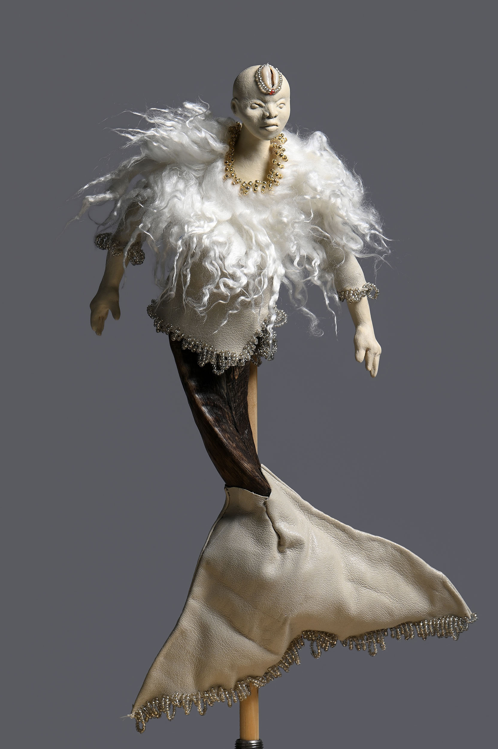Ondine | 2026, goat horn, leather, paper clay, turquoise, faux fur, 16 inches H