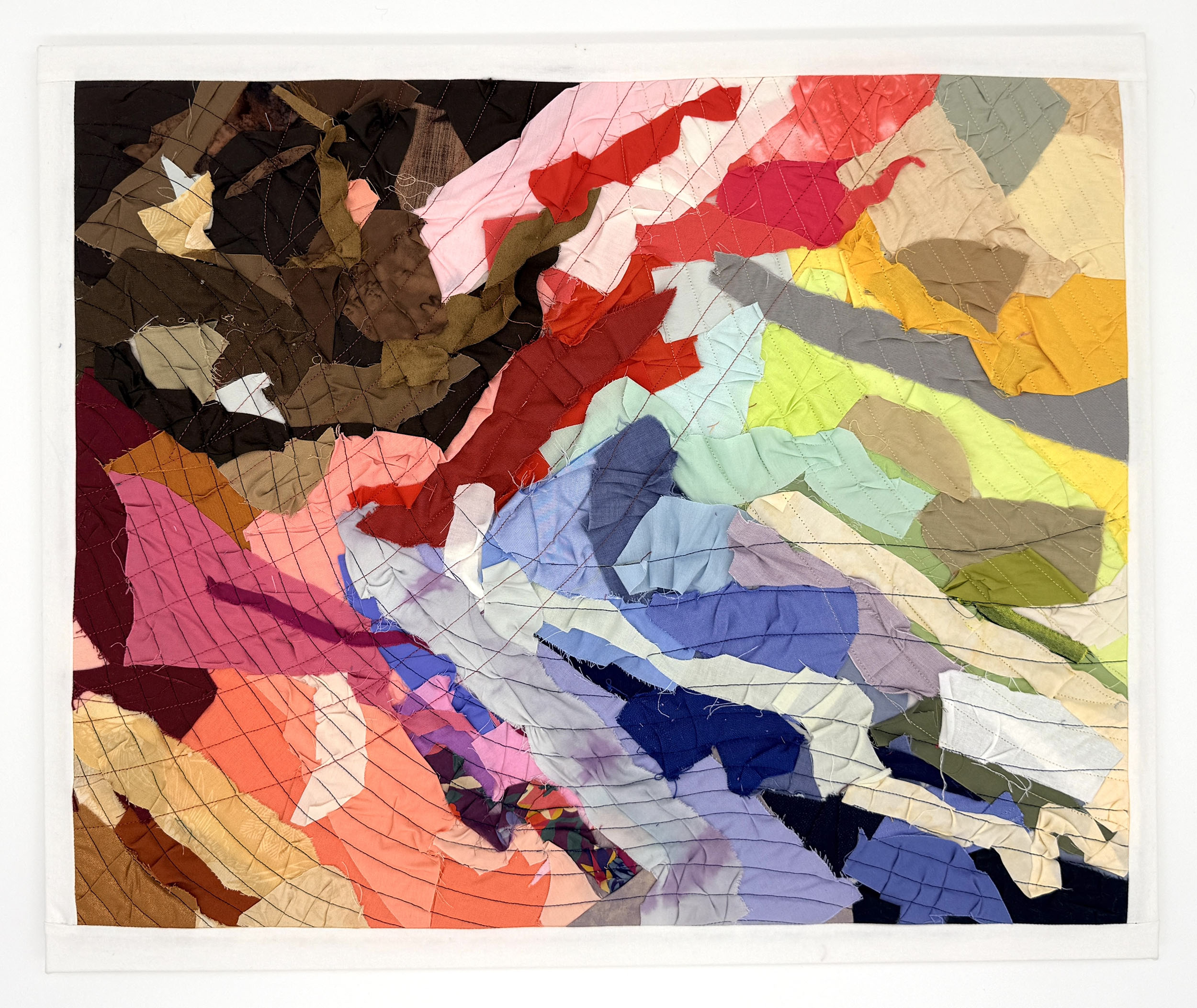 "How Many Colors is the American Flag?" 2026, fiber art, fabric, thread, cotton batting on wood stretcher bars, 16 x 20 inches