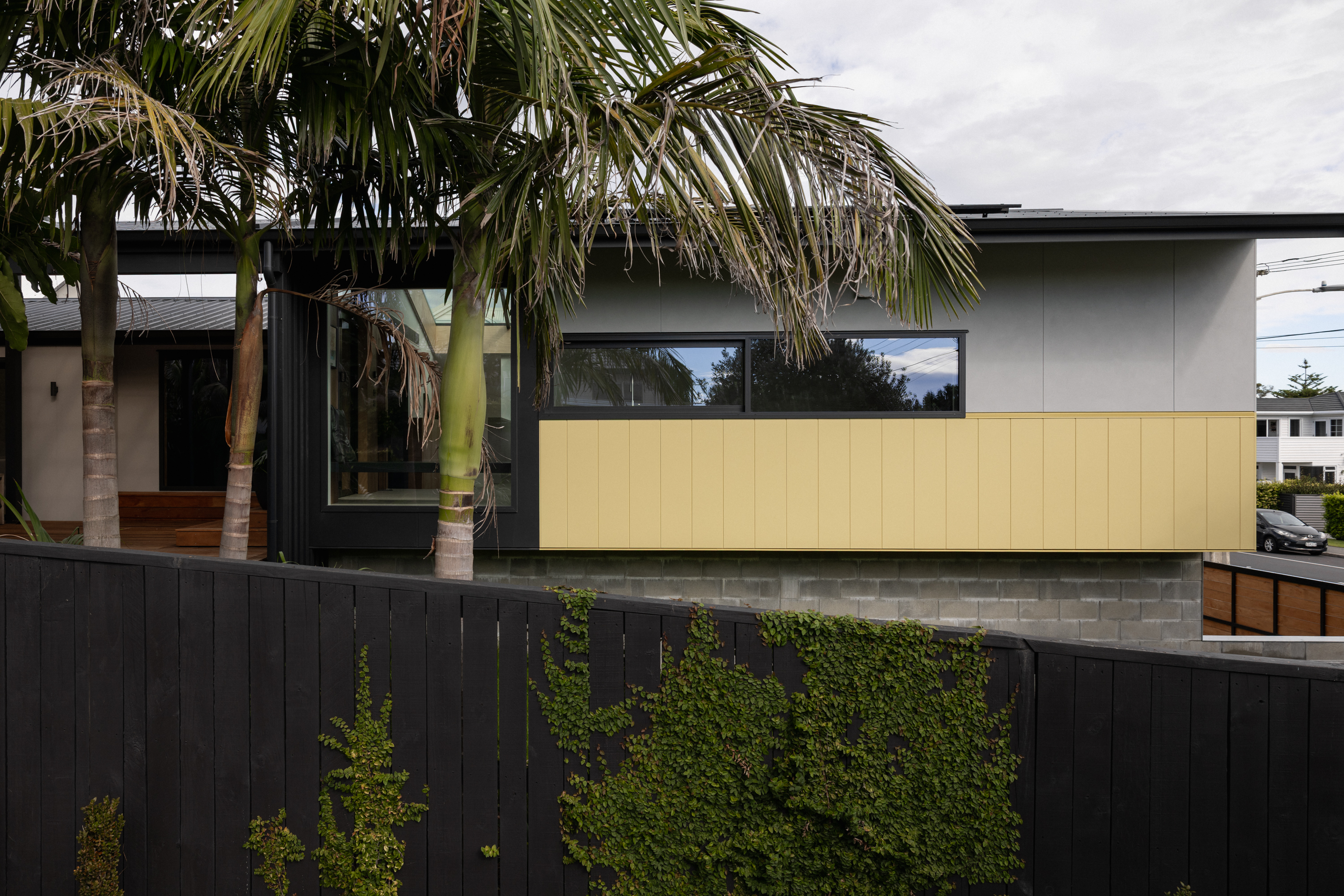 yellow house in the trees