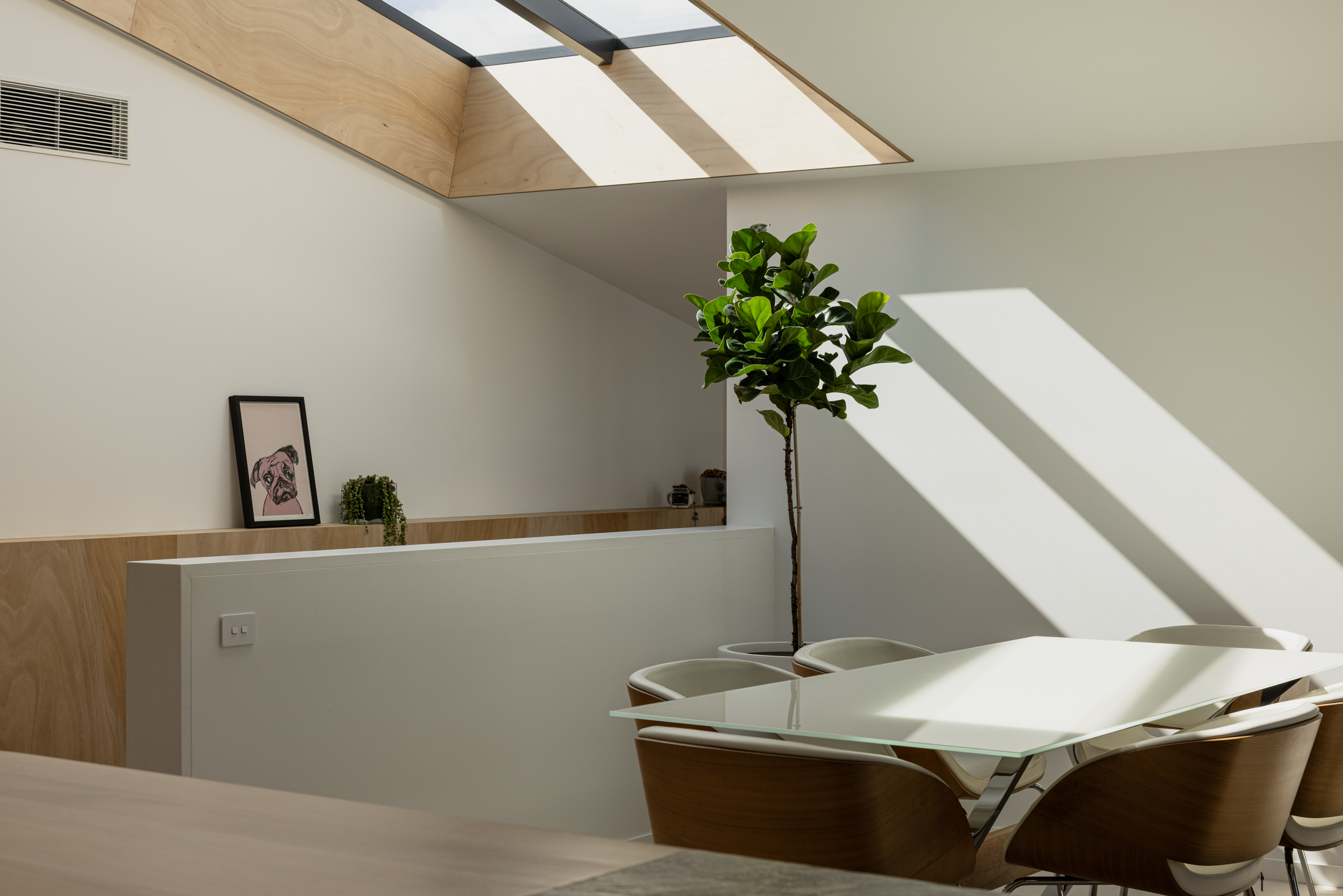 dining area with skylight