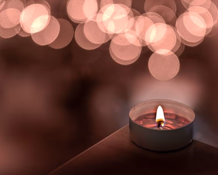 Dark background with candle