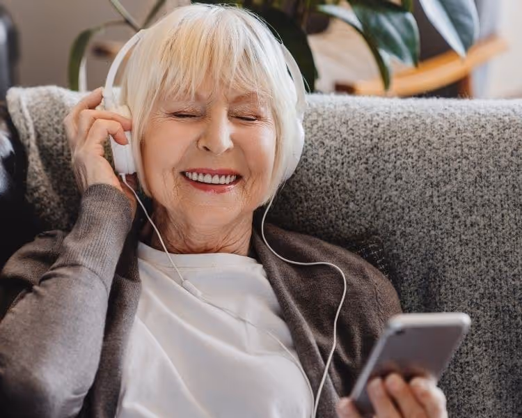 senior women listening to music