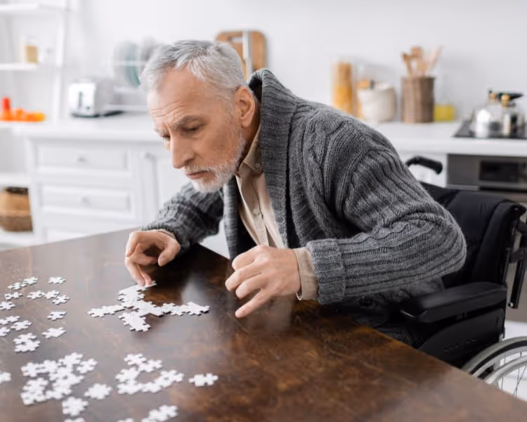 One hand stabilizing another while holding a cup of coffee