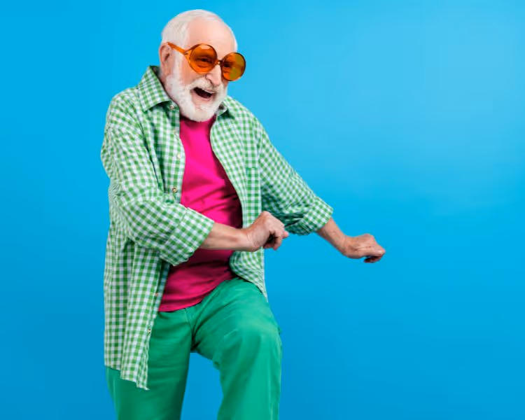 senior man dancing to music