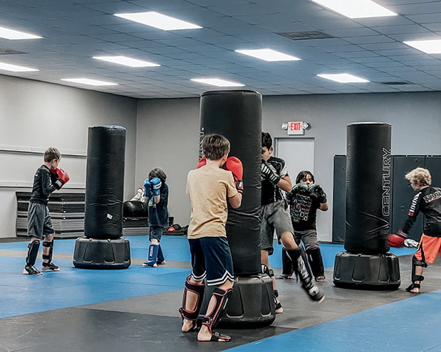 MMA training with gloves and punching bag