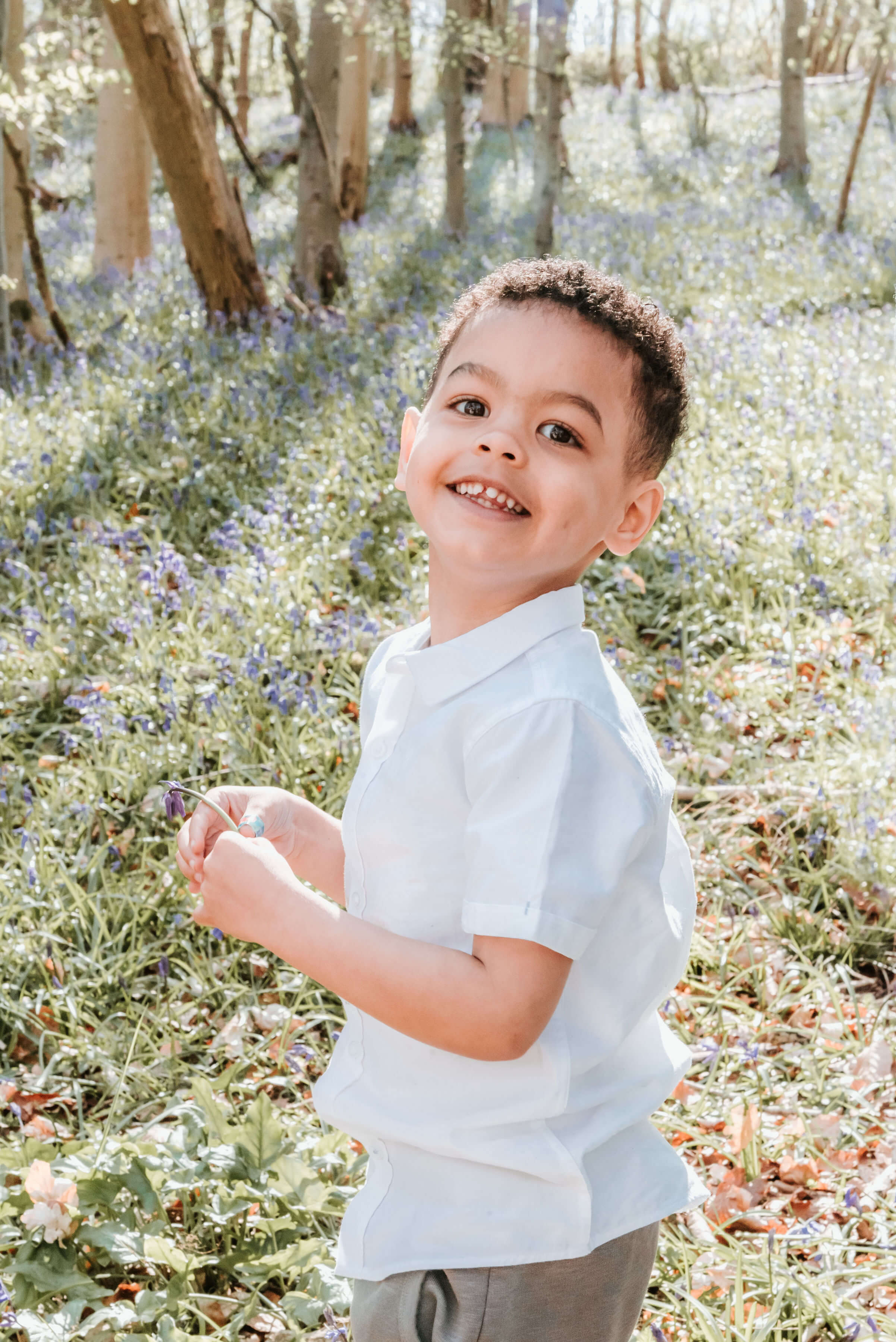 Arlo smiling at the camera, shot by Gemma Randall ©