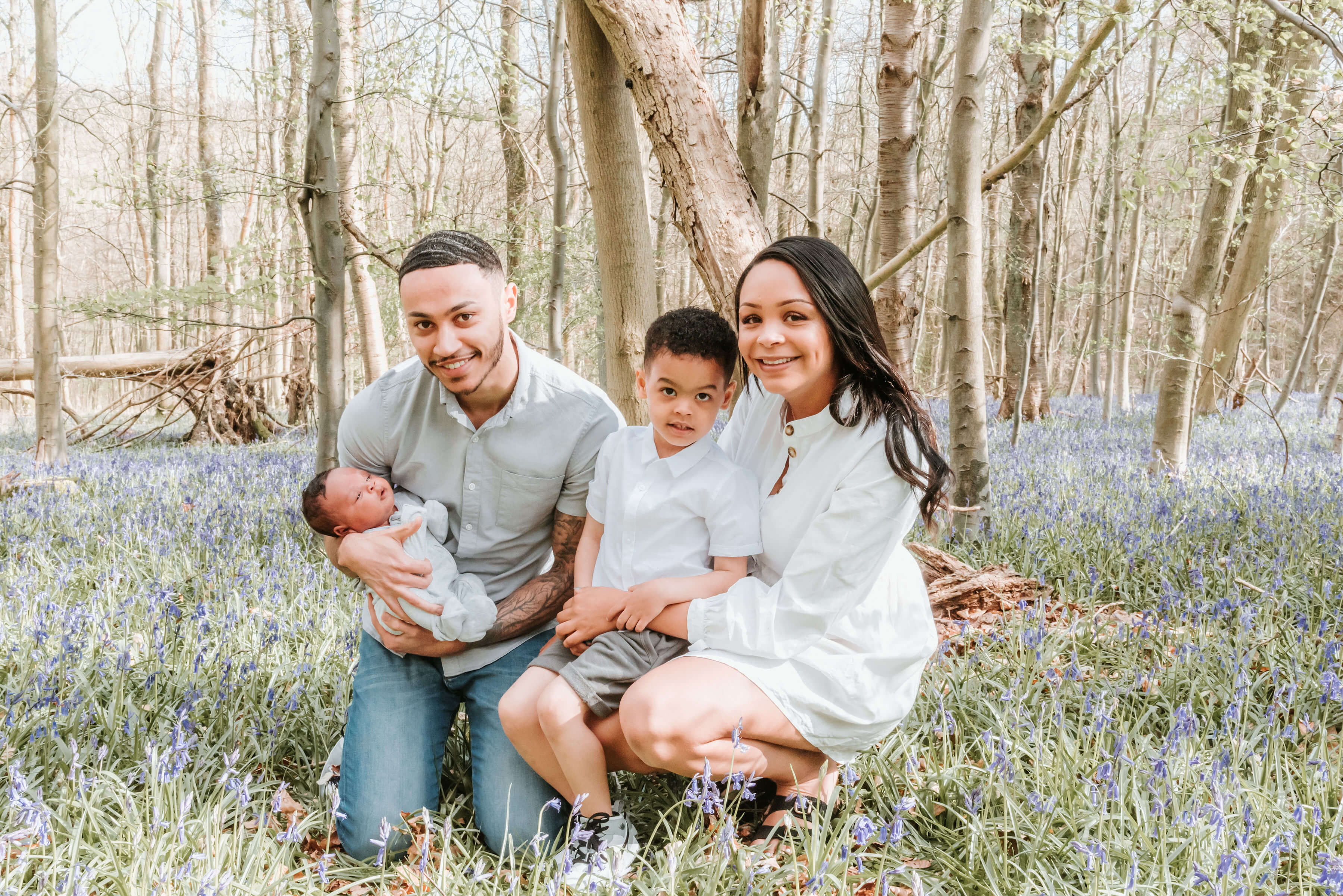 The Scantlebury family sitting in beautiful woodside, shot by Gemma Randall ©