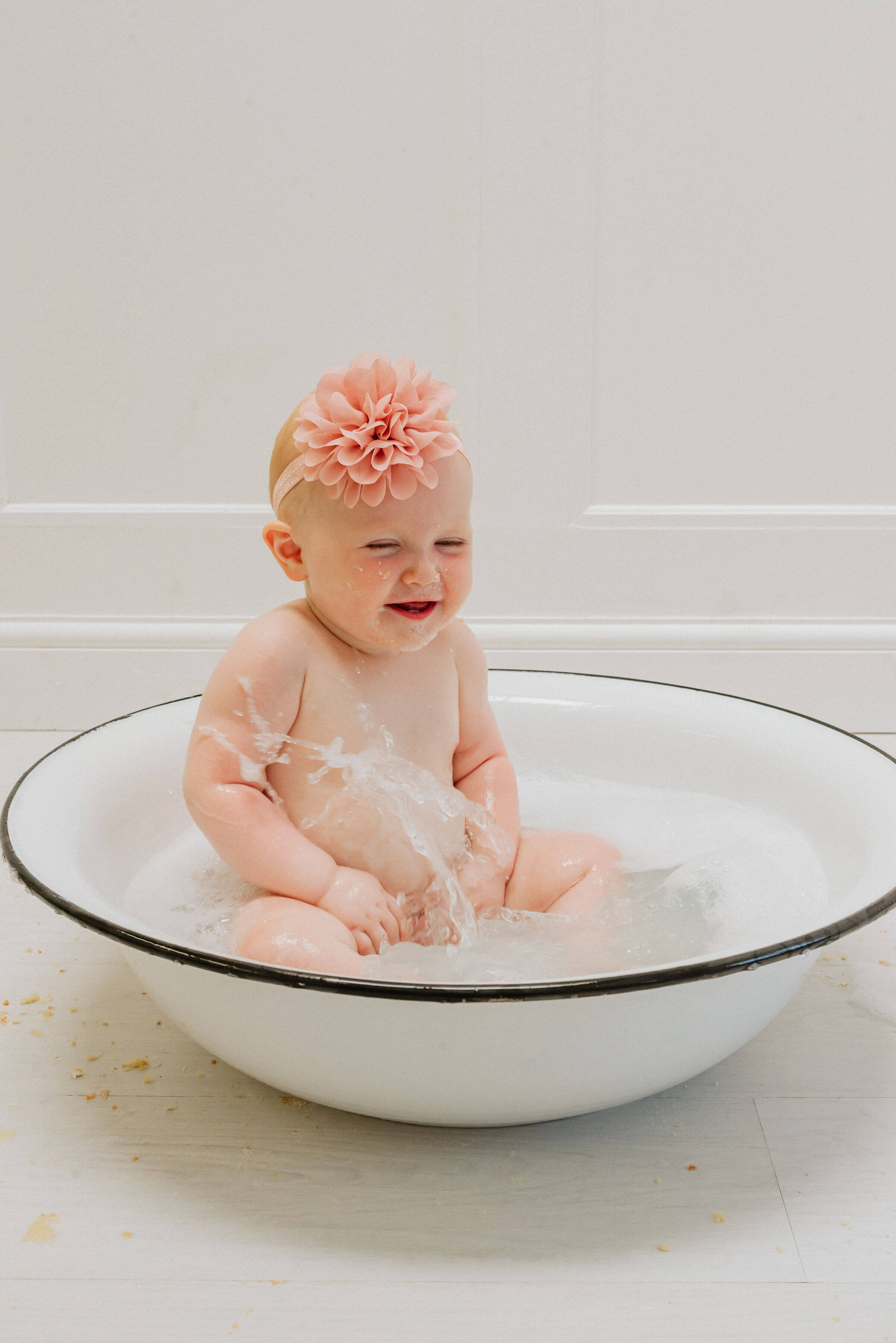 Baby Delilah in a pool of water, shot by Gemma Randall ©