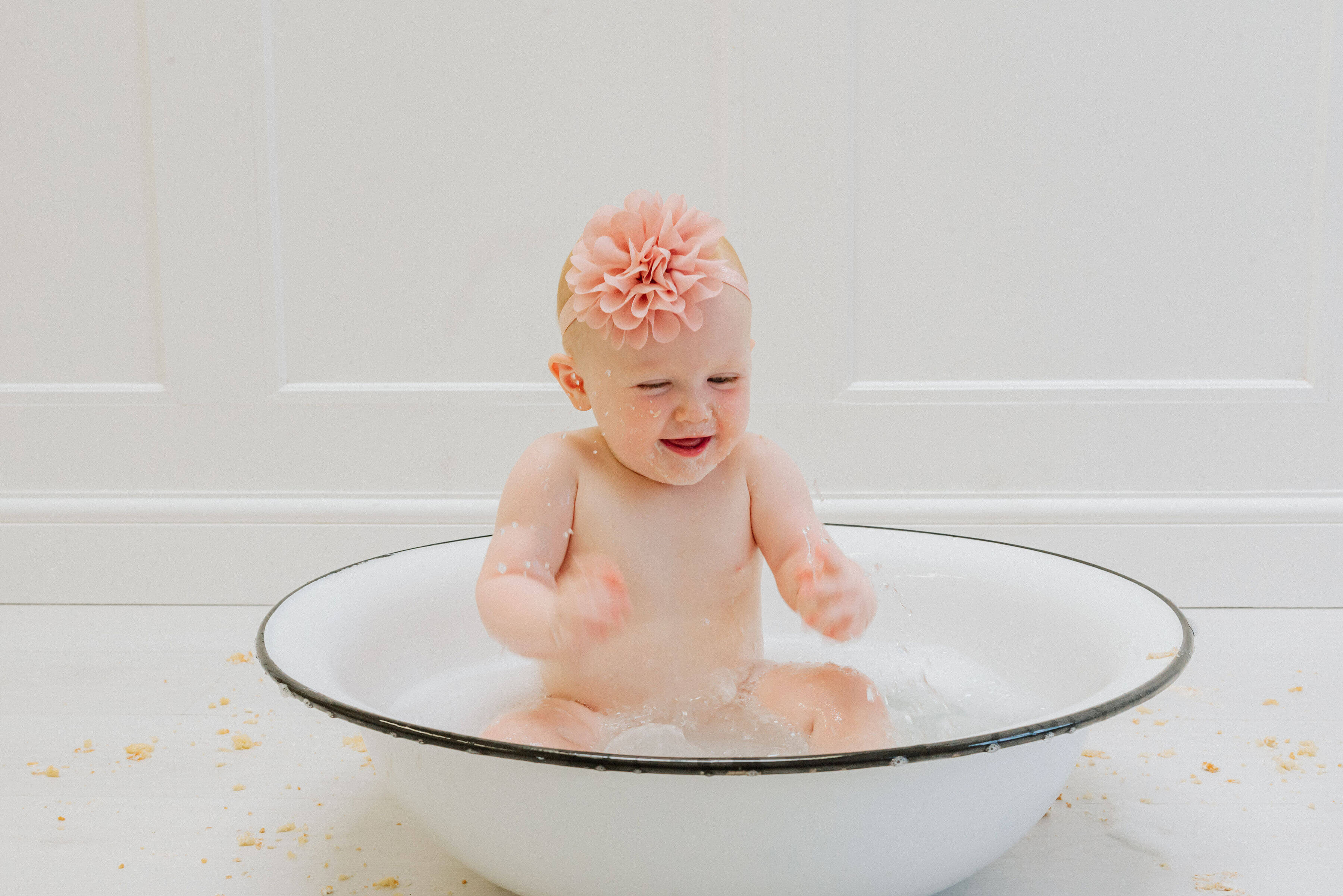 Baby Delilah in a pool of water, shot by Gemma Randall ©