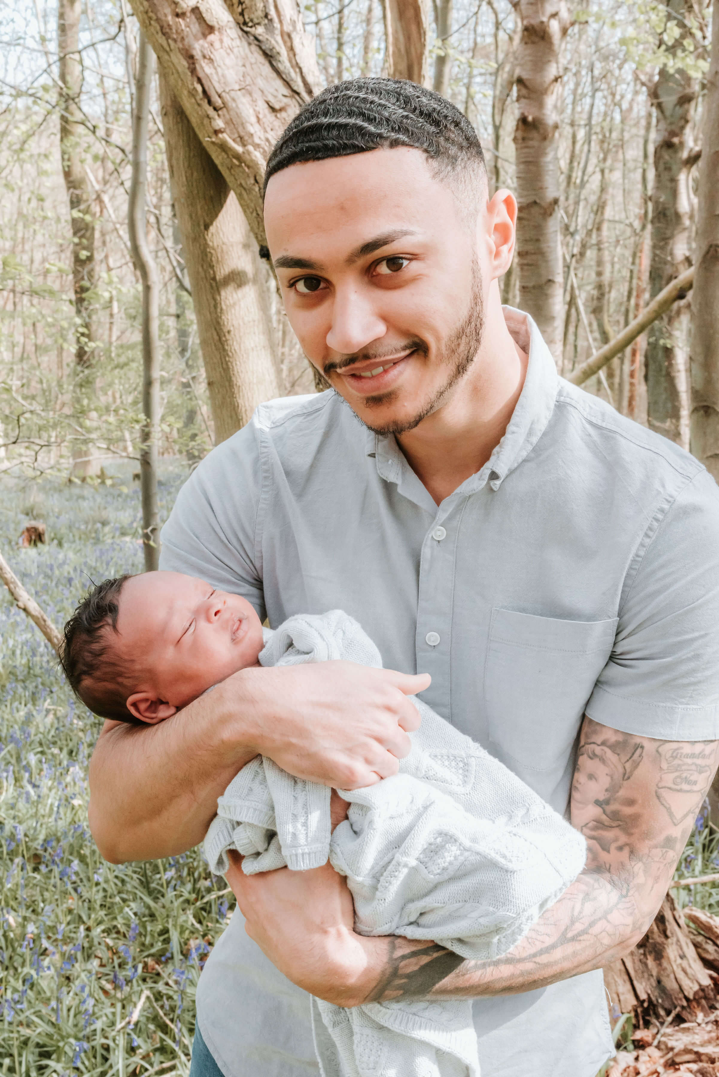 Aaron holding Baby Ovie, The Scantlebury Family, shot by Gemma Randall ©