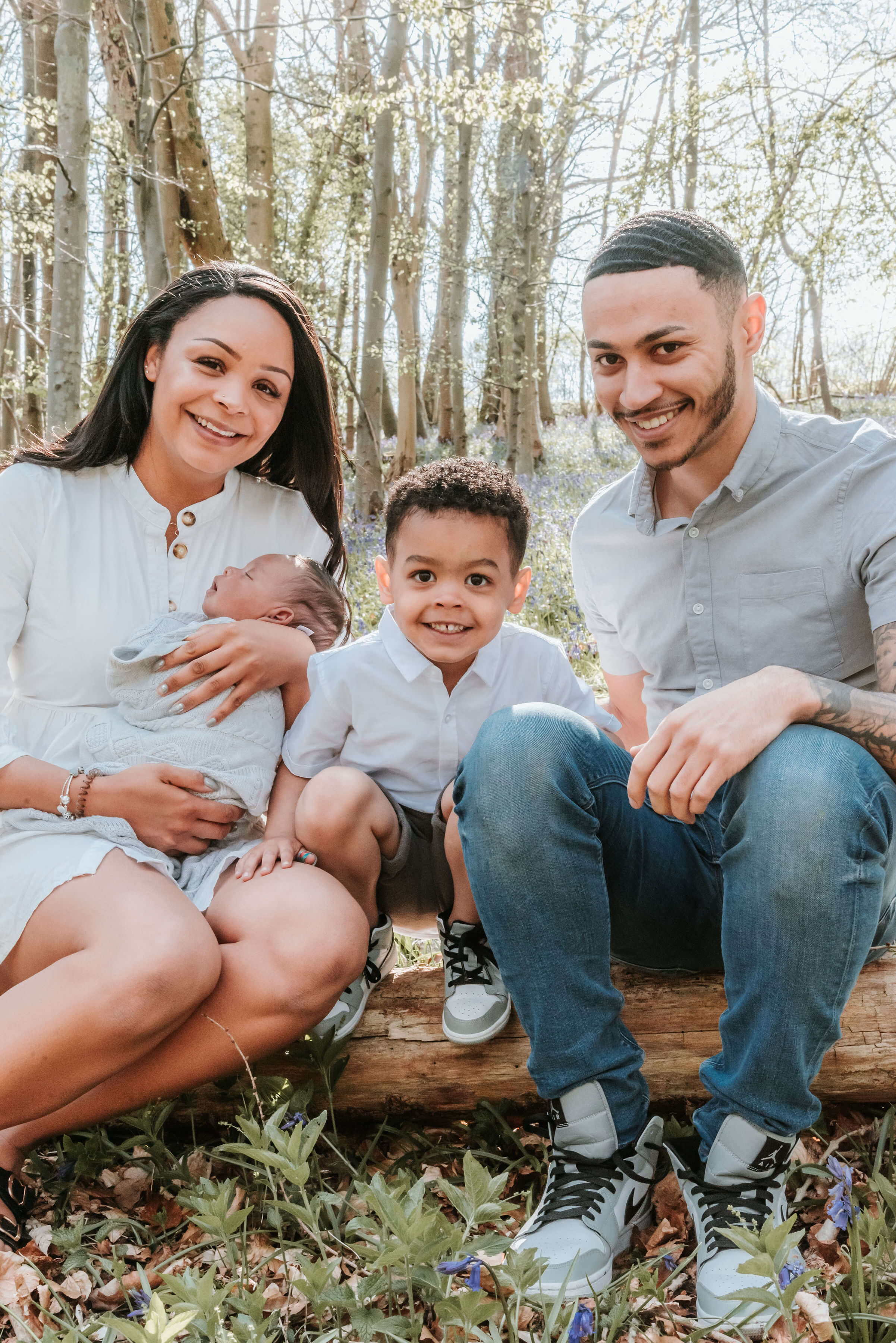 The Scantlebury's sitting on a log of wood, shot by Gemma Randall ©