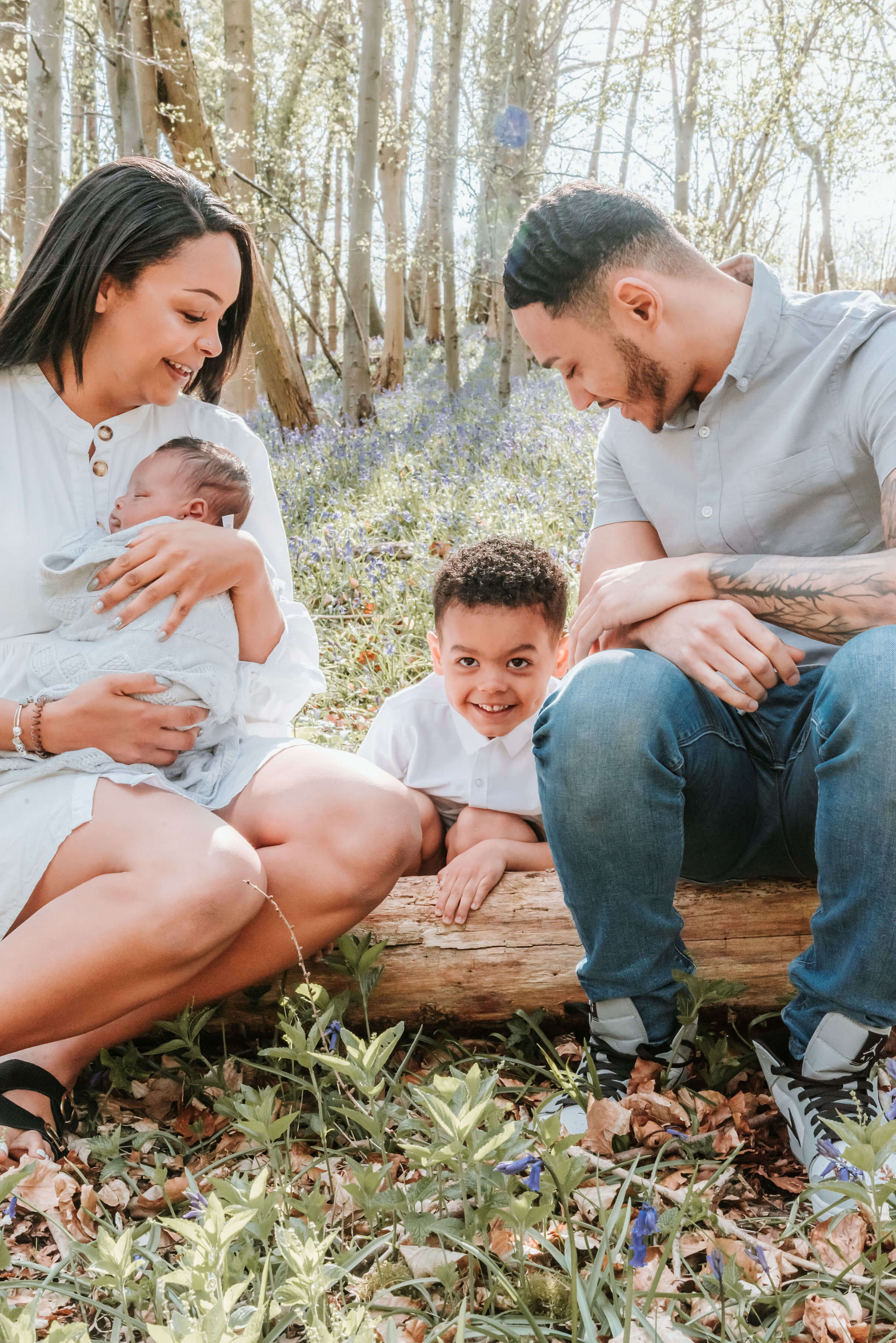 The Scantlebury's sitting on a log of wood, shot by Gemma Randall ©