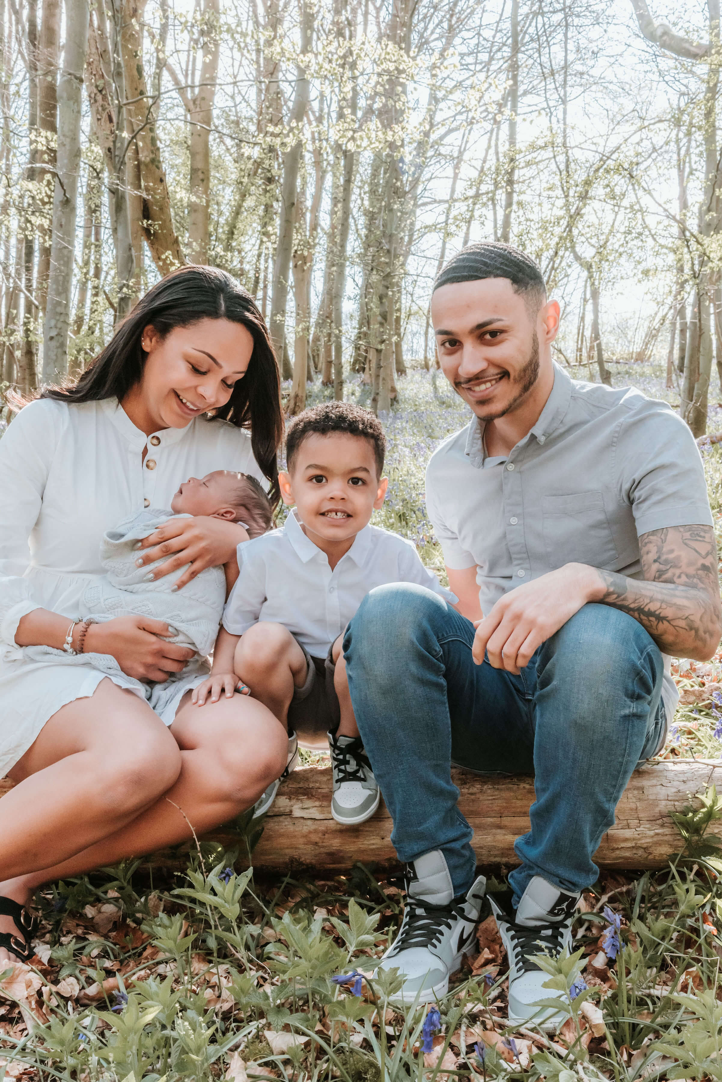 The Scantlebury's sitting on a log of wood, shot by Gemma Randall ©