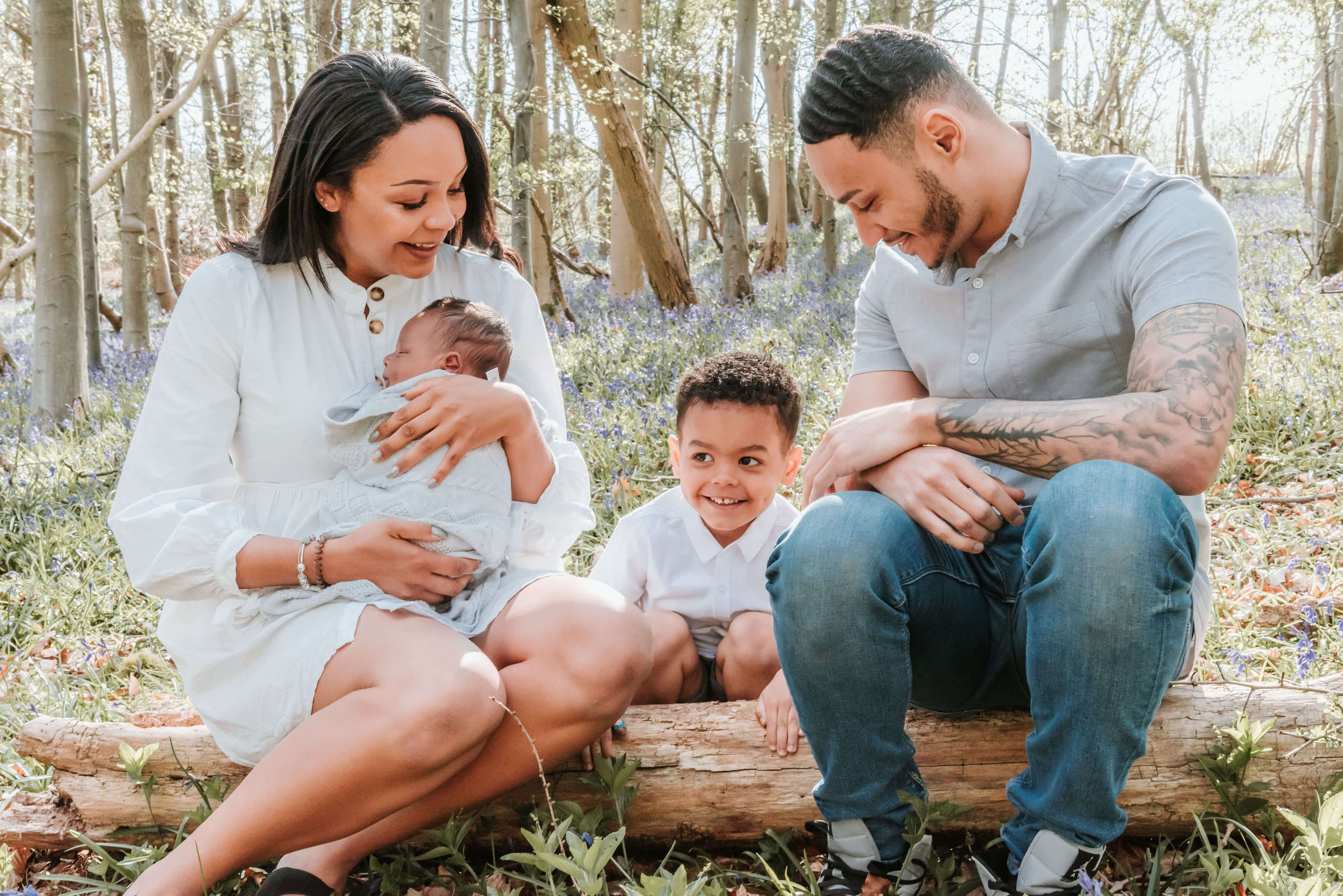 The Scantlebury family sitting in beautiful woodside, shot by Gemma Randall ©