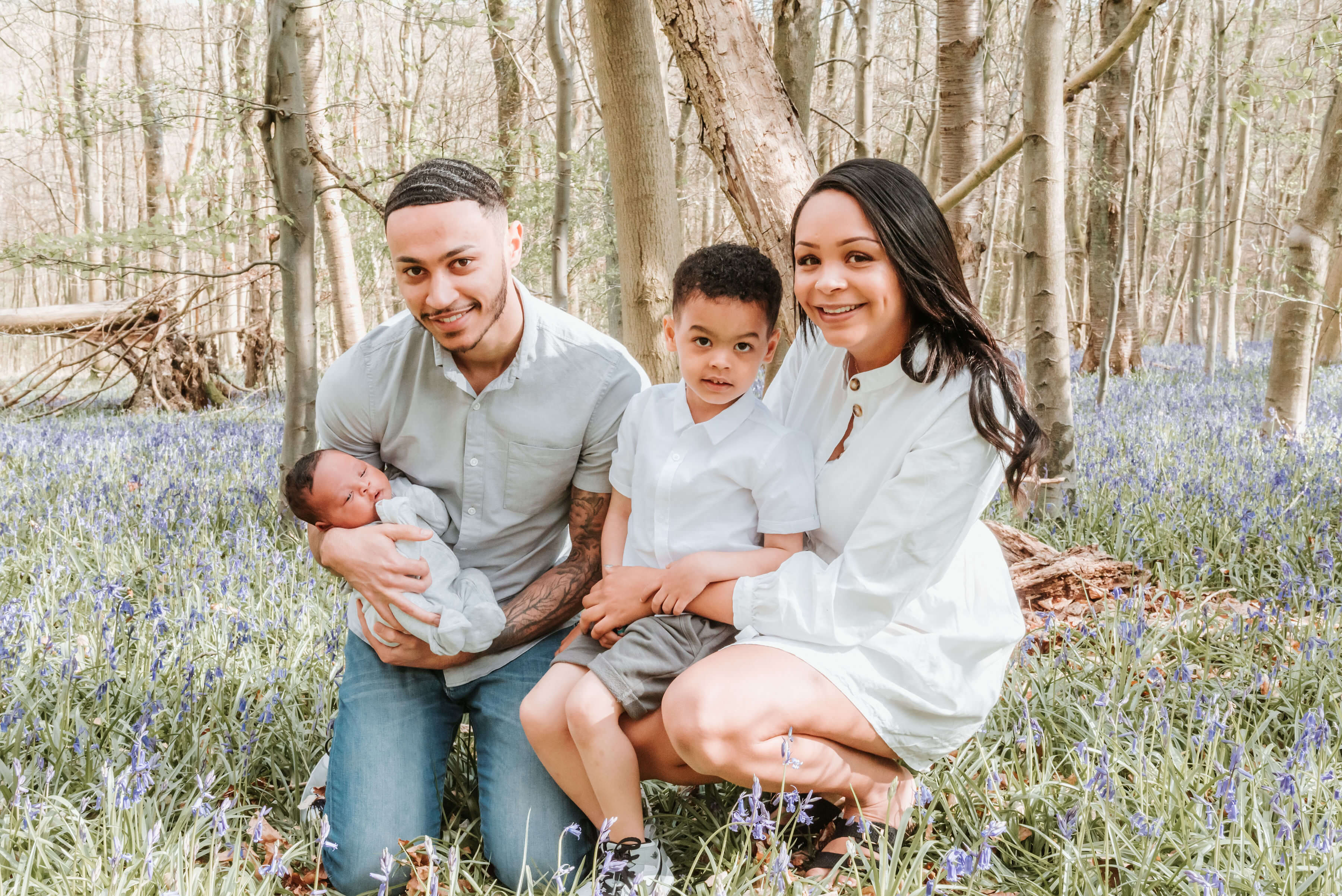The Scantlebury family sitting in beautiful woodside, shot by Gemma Randall ©