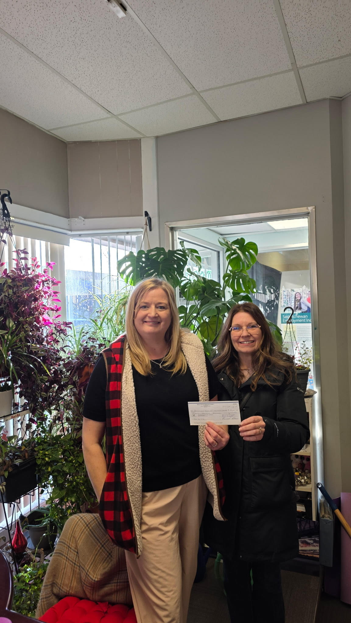 Cheque/presentation photo: A $20,000 donation cheque presentation from Meota United Anglican Church supporting community programs.