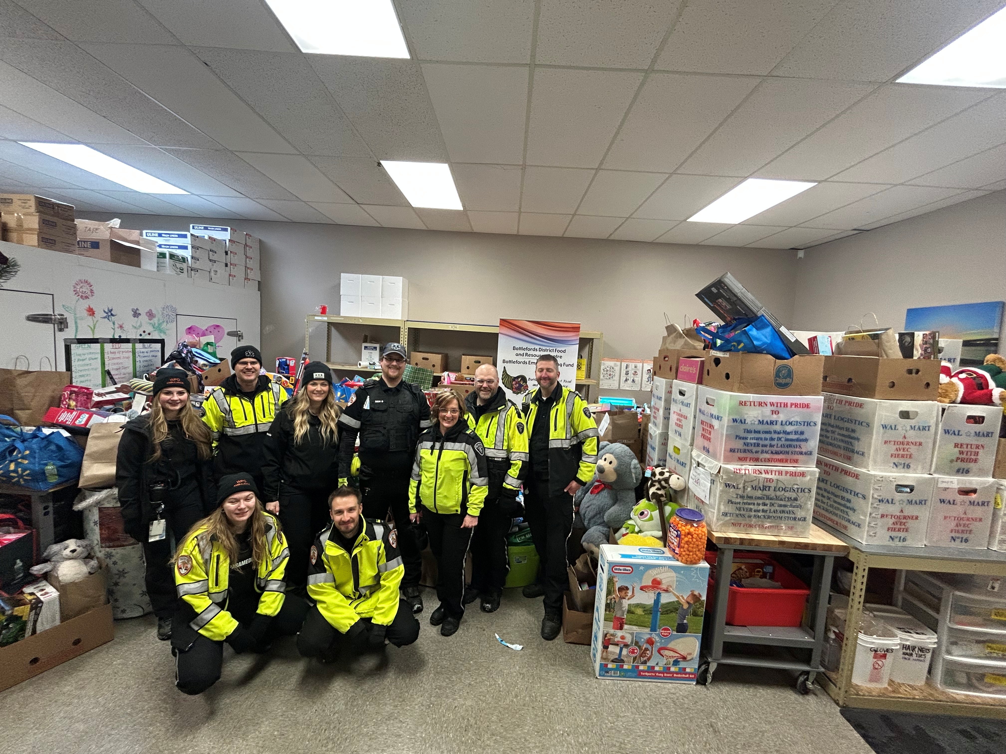 WPD Ambulance parked and being filled with donated toys for kids during the Cram the Ambulance Christmas toy drive.
