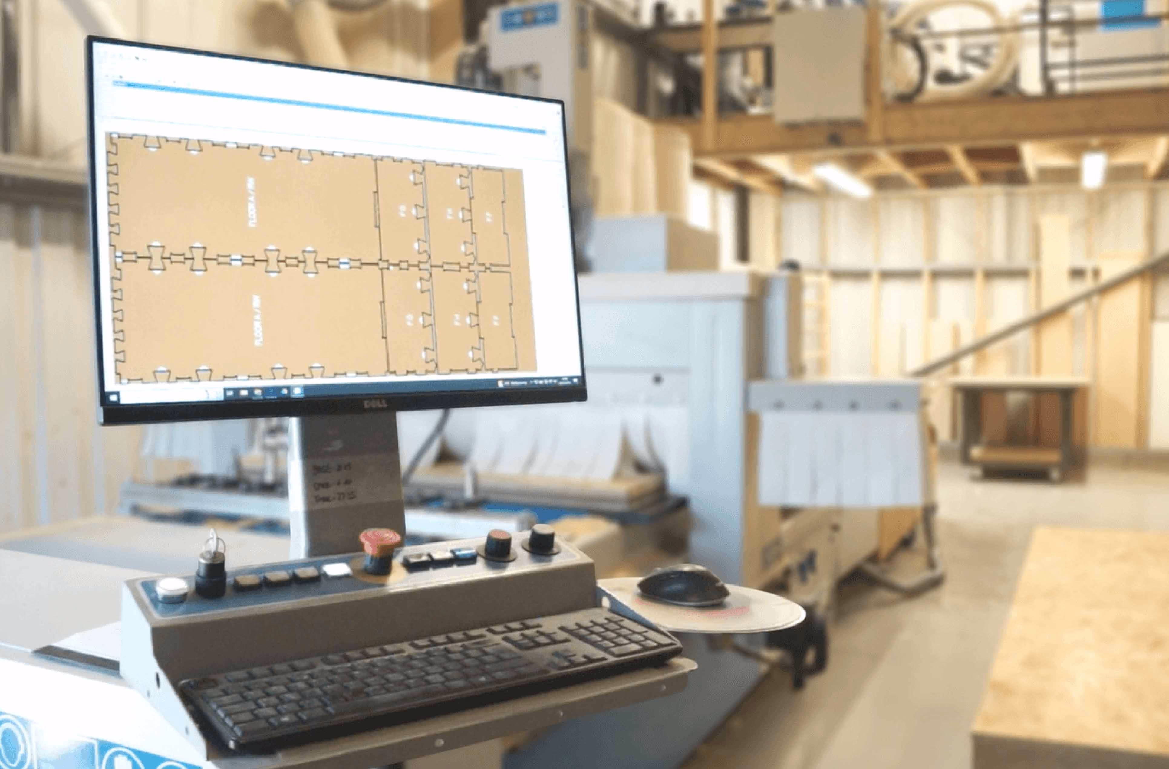 Computer screen in factory showing WikiHouse parts.
