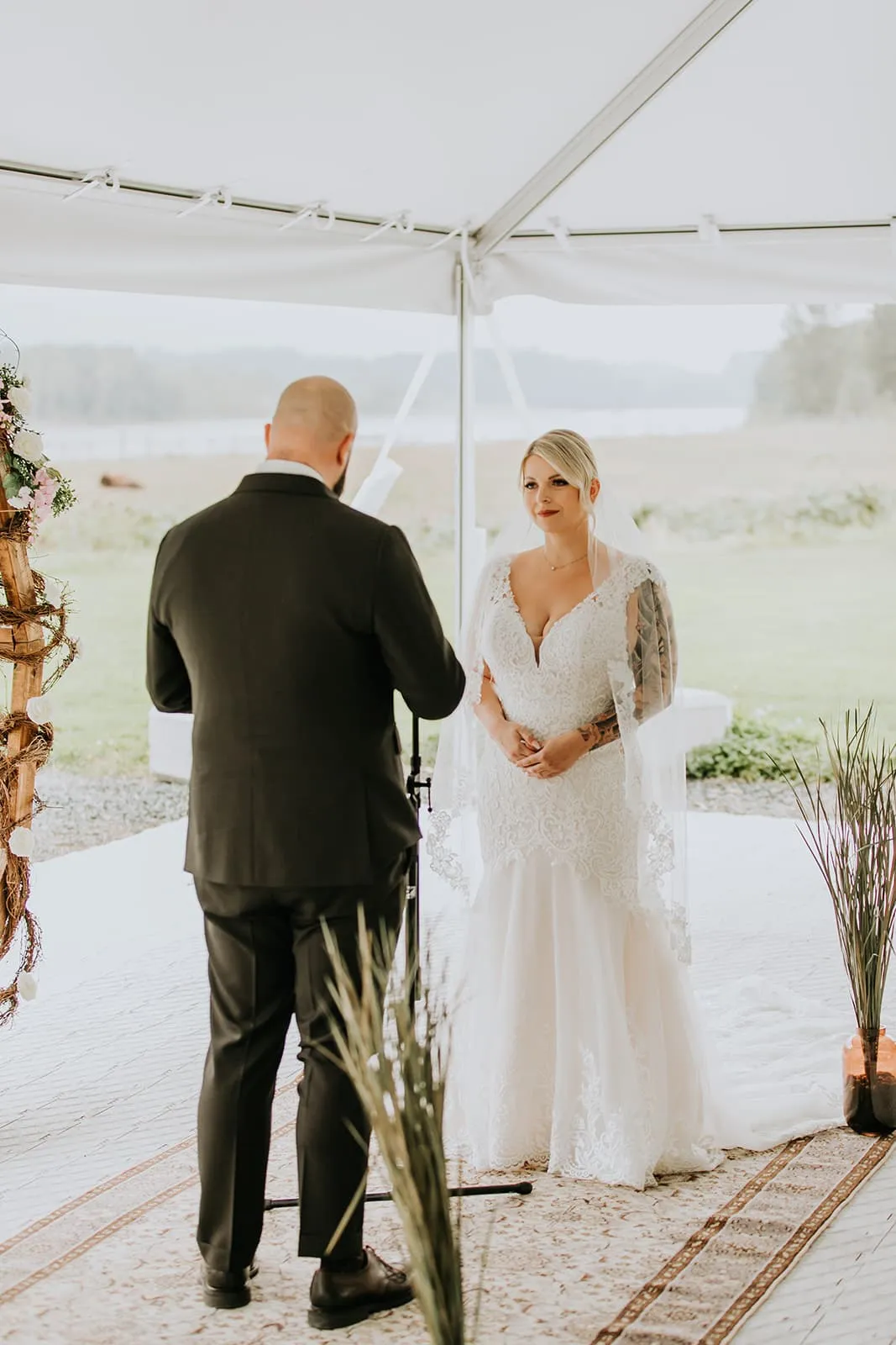 Bride looking at the groom saying their vows