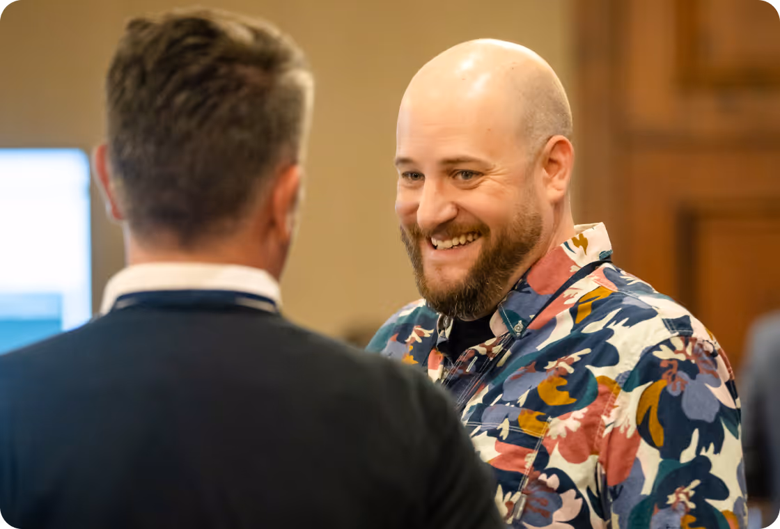 Happy employee smiling while talking