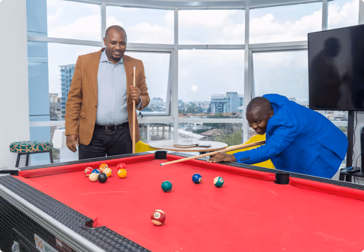 workpay employees enjoying a game of pool