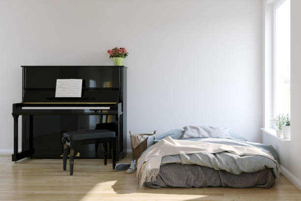 photo d'un chambre avec un piano et un lit