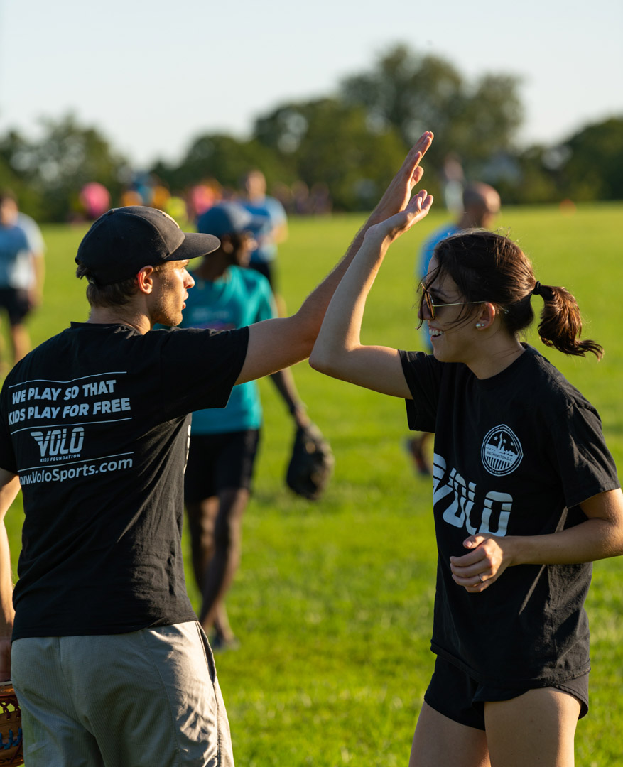 two teammates high-fiving