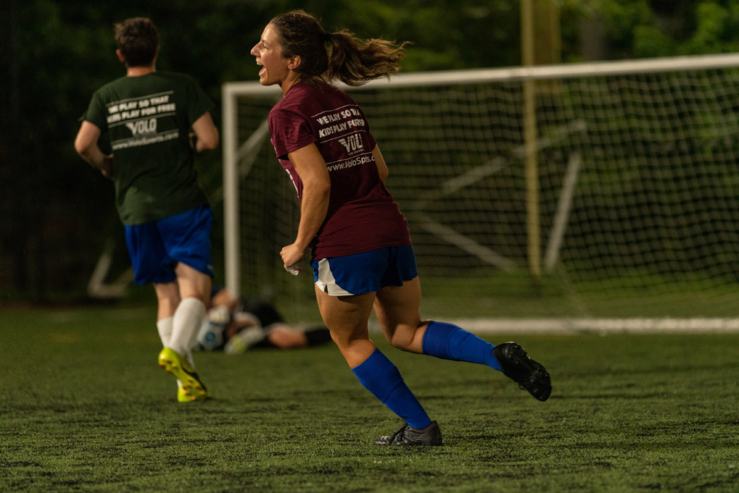 girl playing soccer