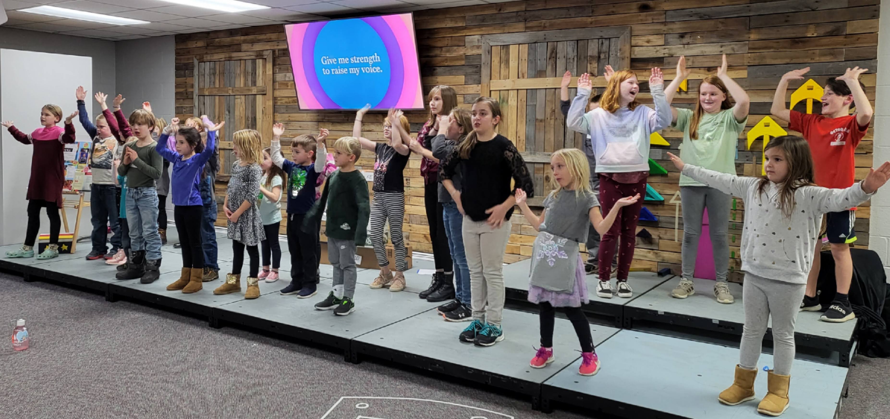 a photo of pequea kids during an activity session