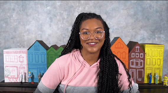 Photo of a lady with curly hair and white eyeglasses at Pequea Church