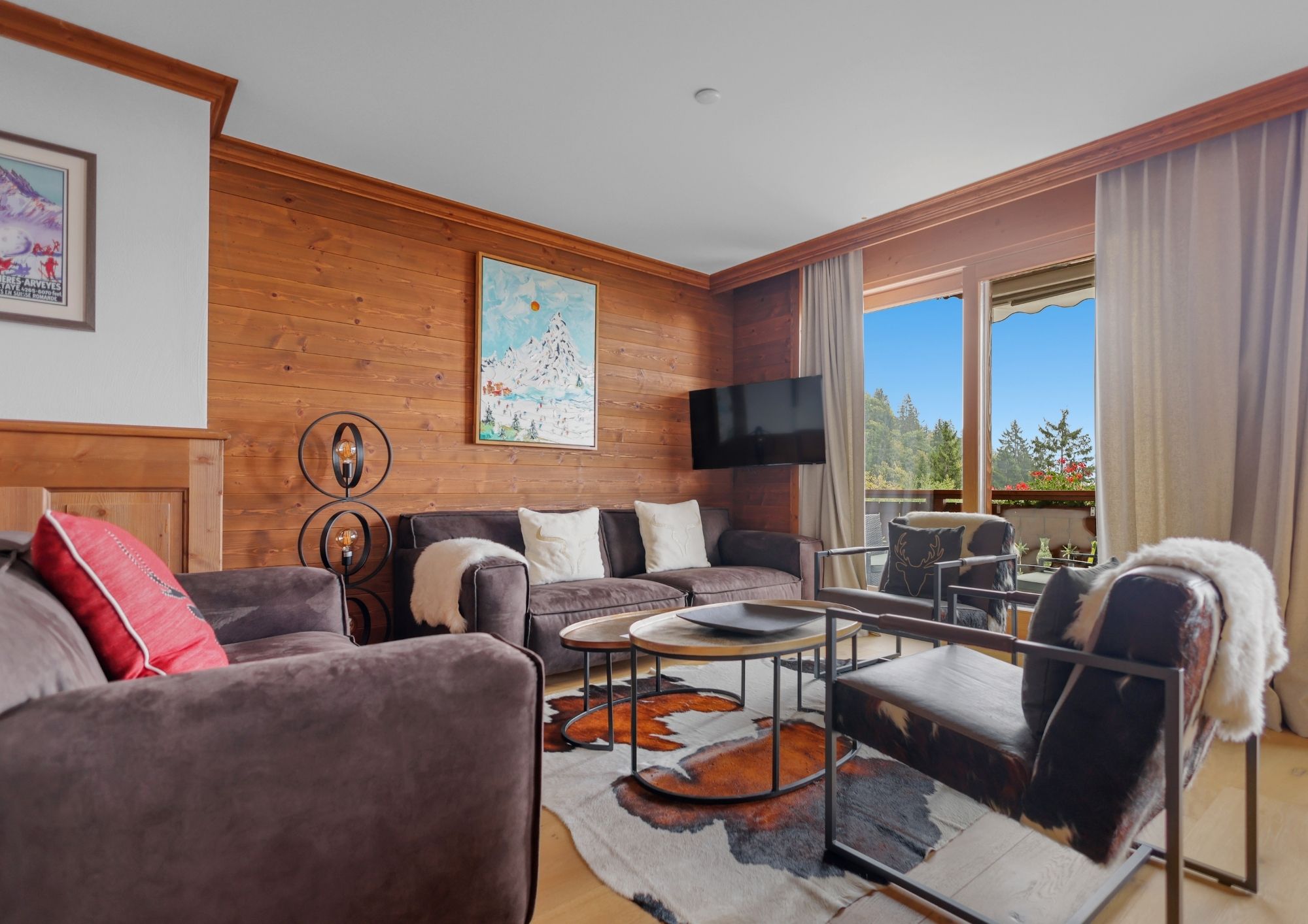 Interior of a Chalet RoyAlp residence in Villars, made of wood and mineral stone