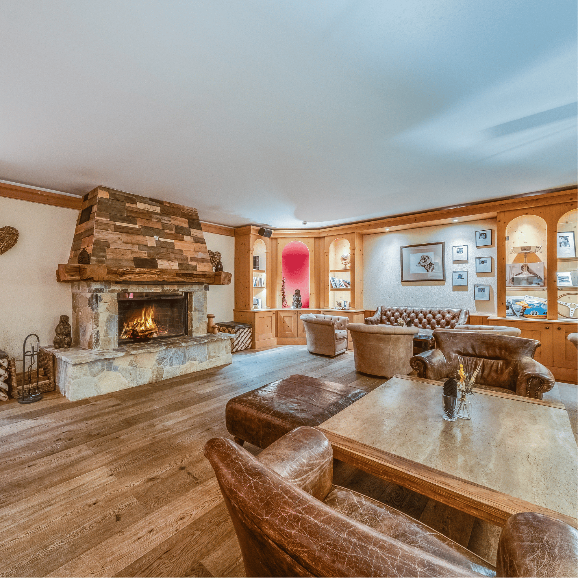 Photo of the interior of a room at the Chalet RoyAlp hotel, where the atmosphere is warm and inviting. 