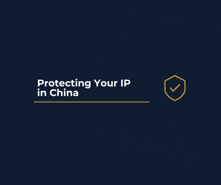 Australian business owner reviewing an NNN agreement contract with a Chinese manufacturing partner to protect product intellectual property