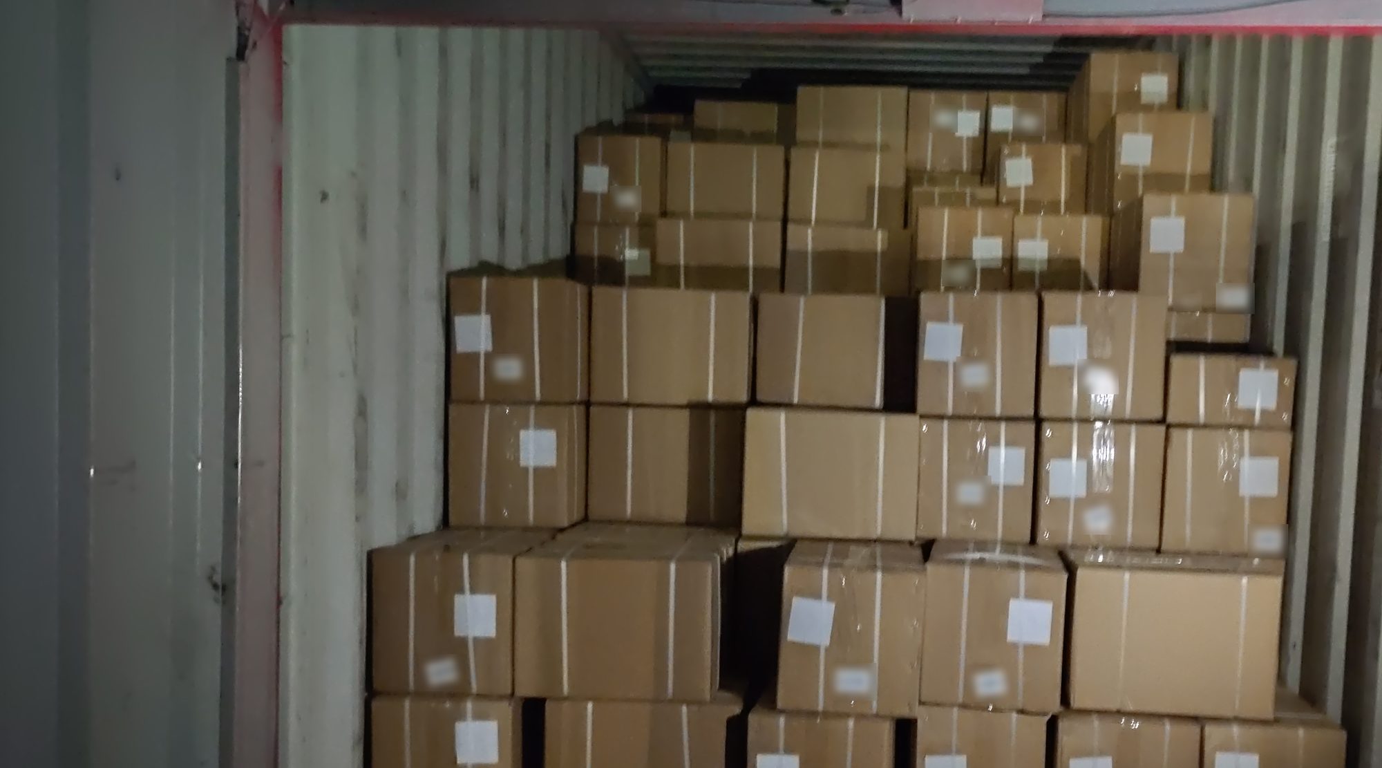 Cartons loaded inside a shipping container for sea freight