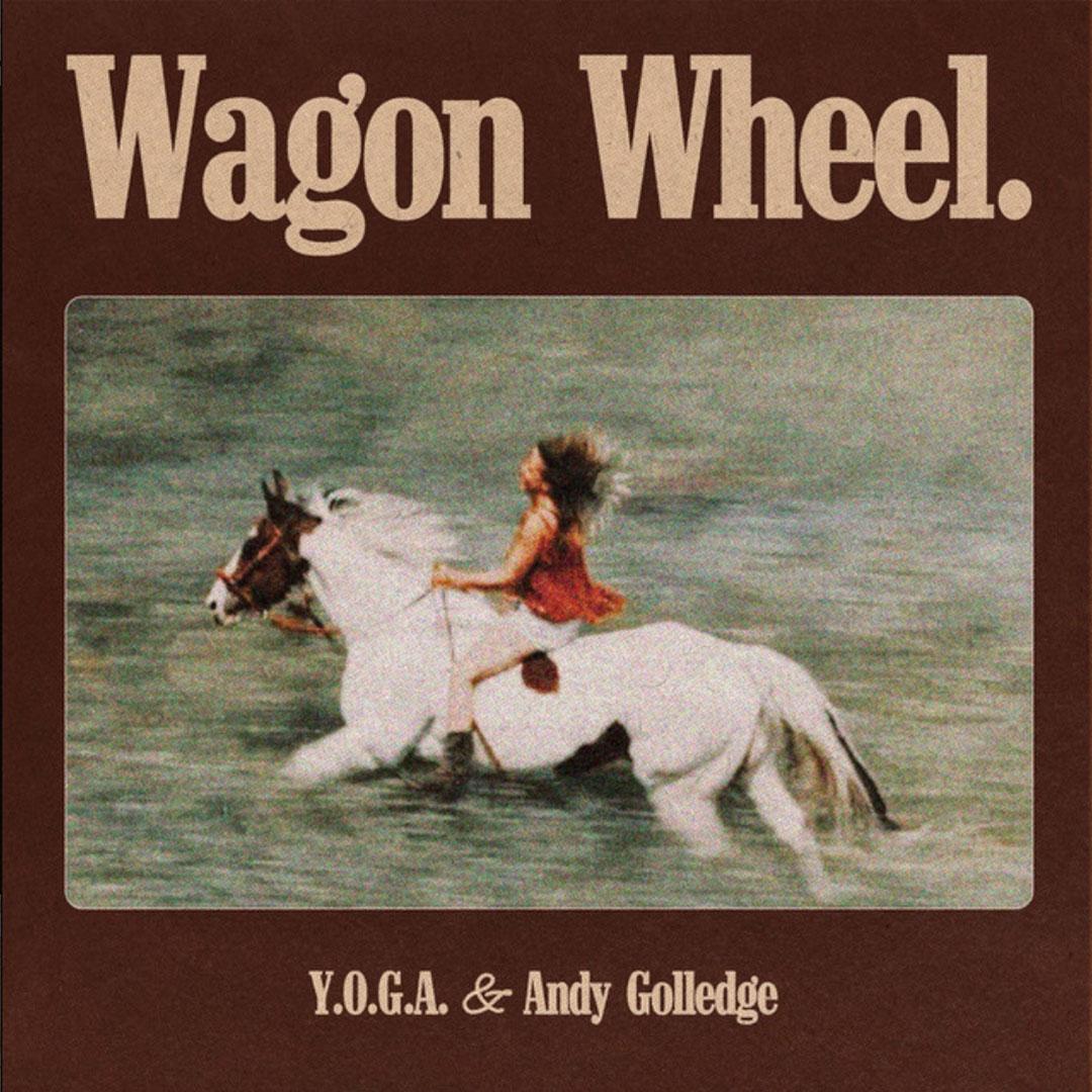 Album cover with the title 'Wagon Wheel' showing a person riding a white horse in a blurred motion.