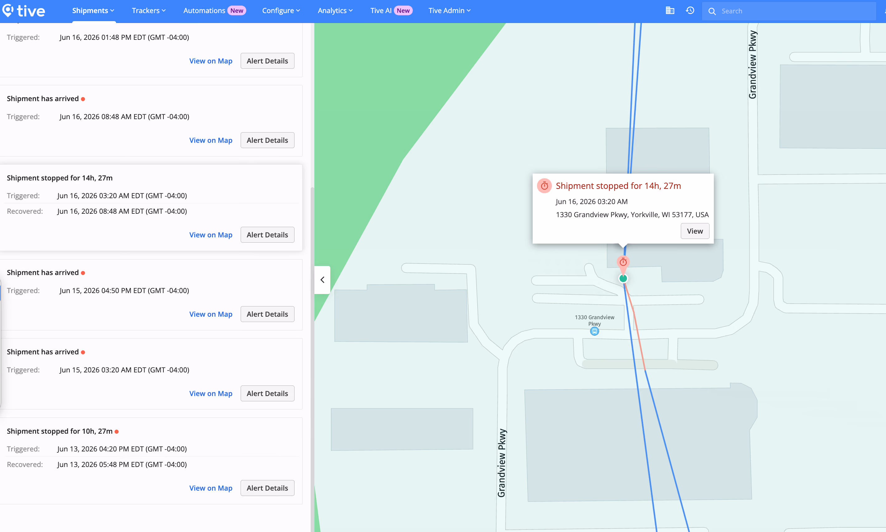 Appareil de suivi bleu Tive Solo 5G avec code-barres, étiquette jaune et bouton de démarrage avec voyants lumineux.