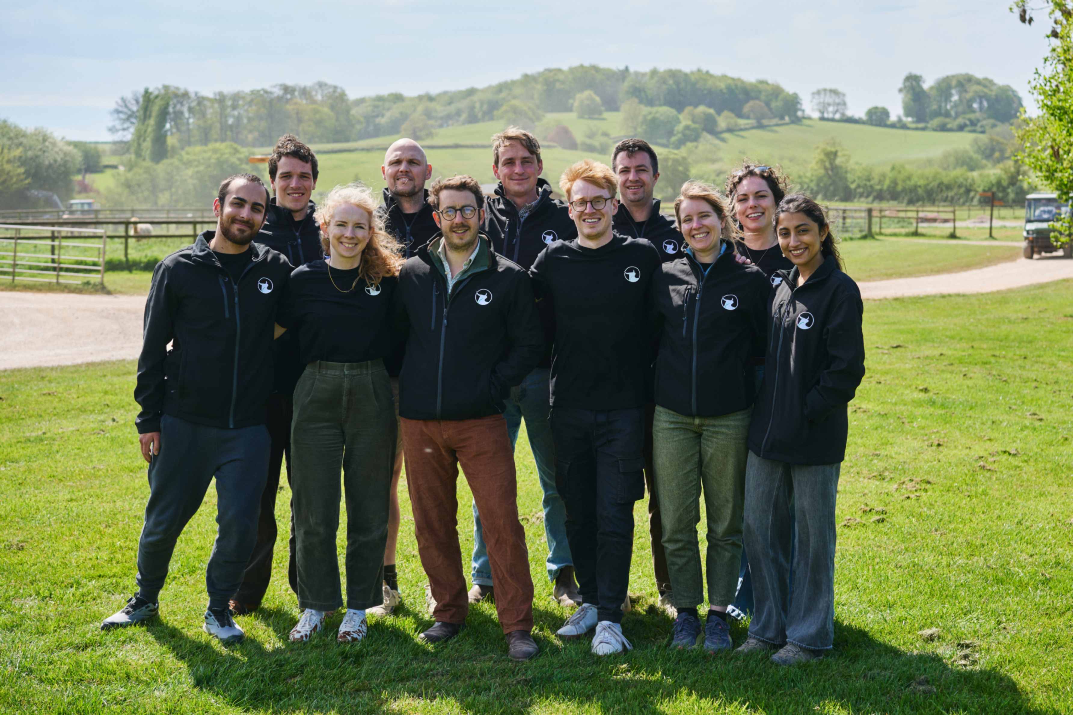 The Black Bull Biochar team celebrating on a farm
