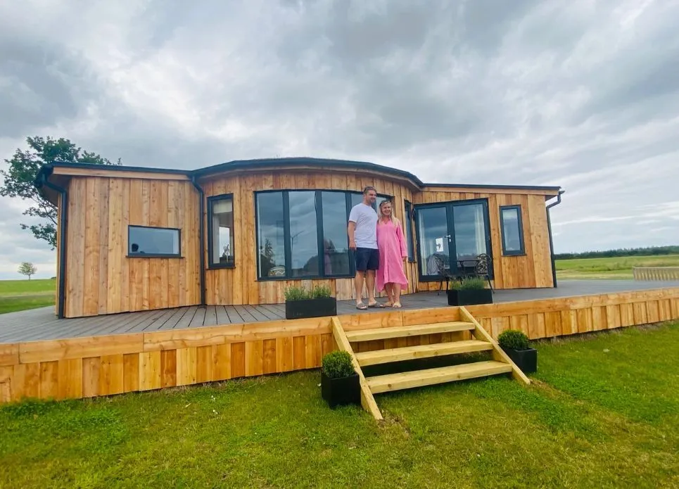 two people outside lodge