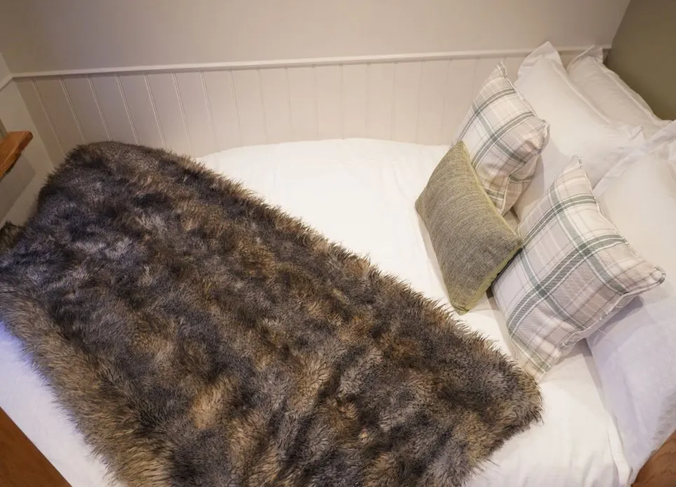 cosy shepherds hut bed