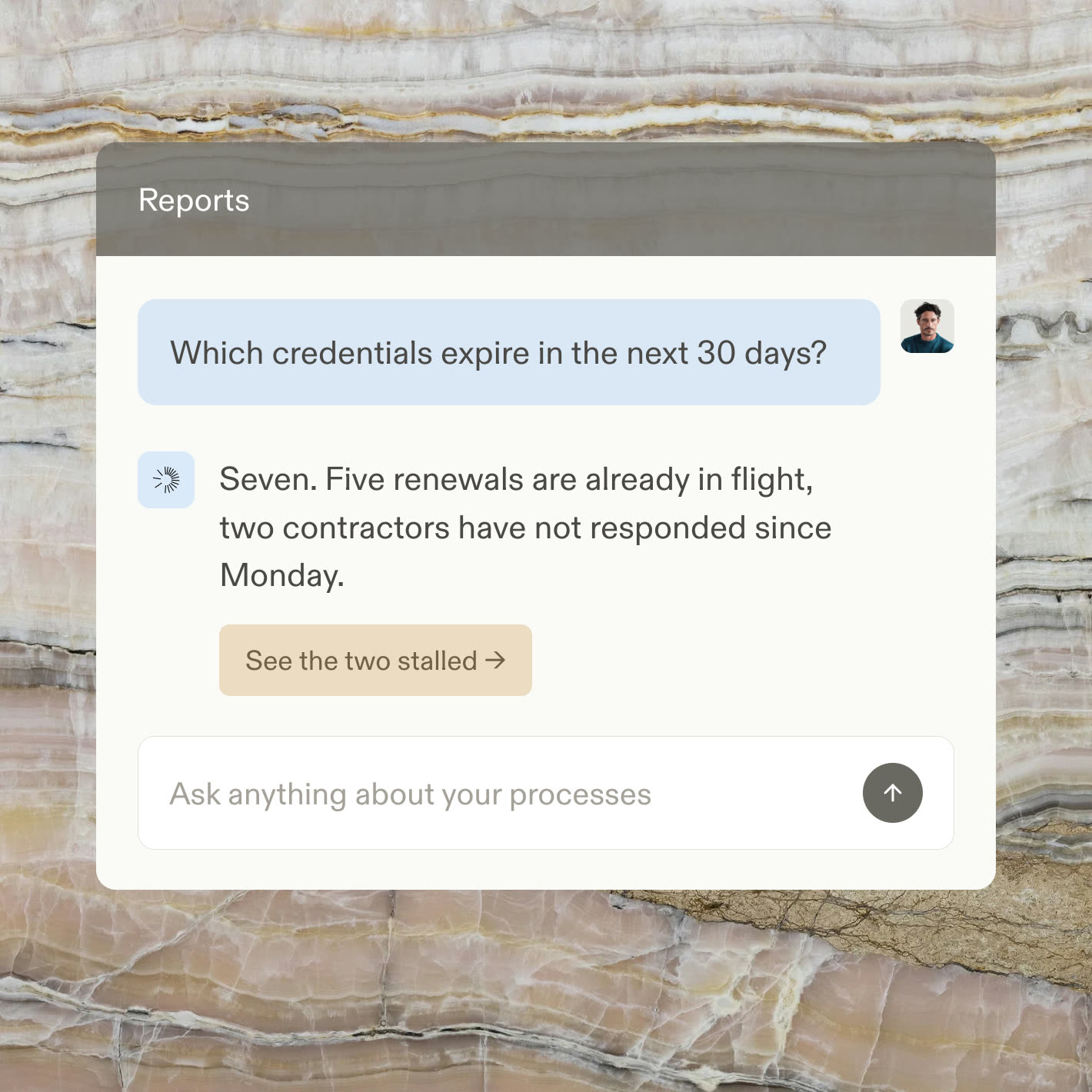 A reports chat answering which contractor credentials expire next month