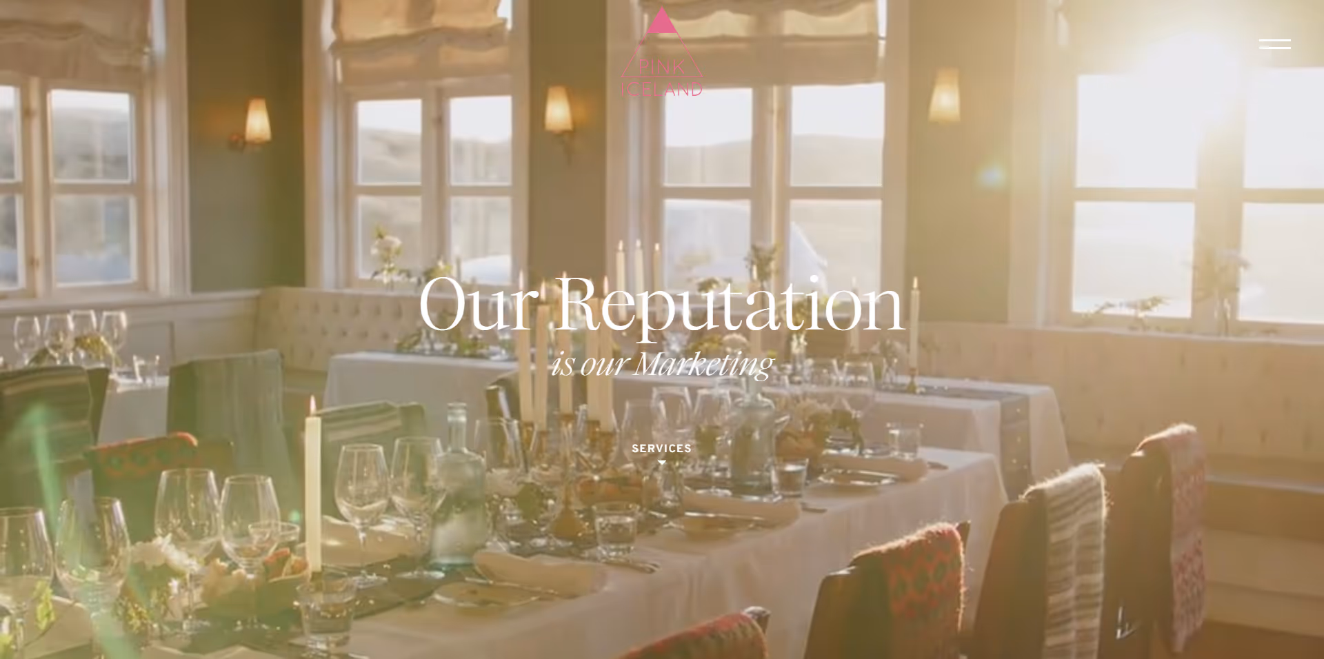 A wedding reception scene featuring decorative elements and the words "Our Reception" displayed on the wall.