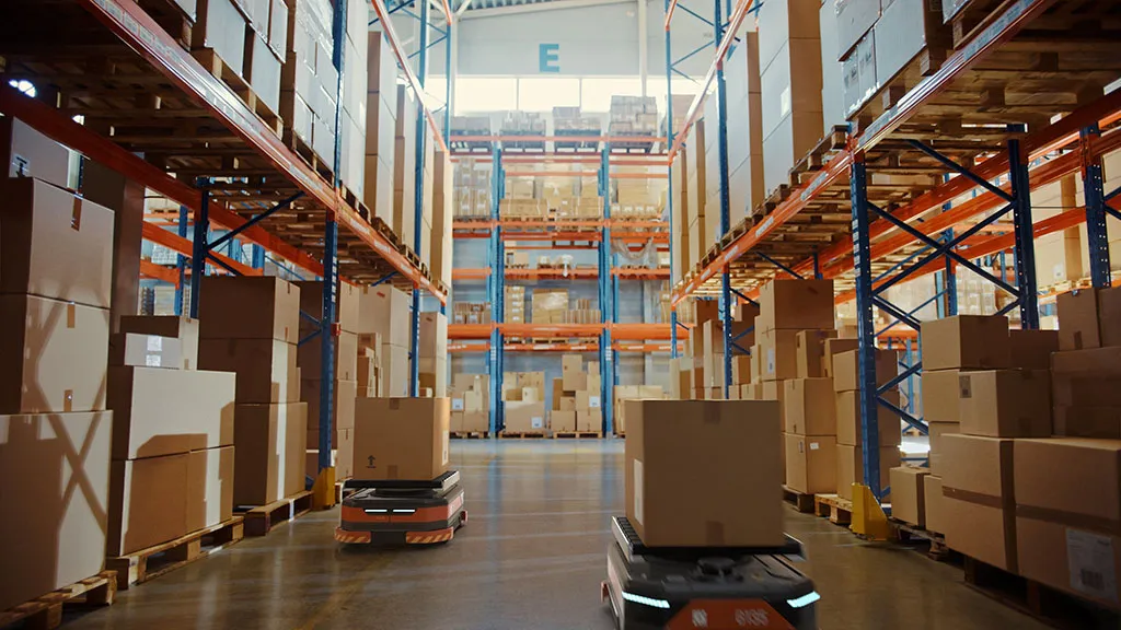 Automated carts driving around in a smart warehouse.