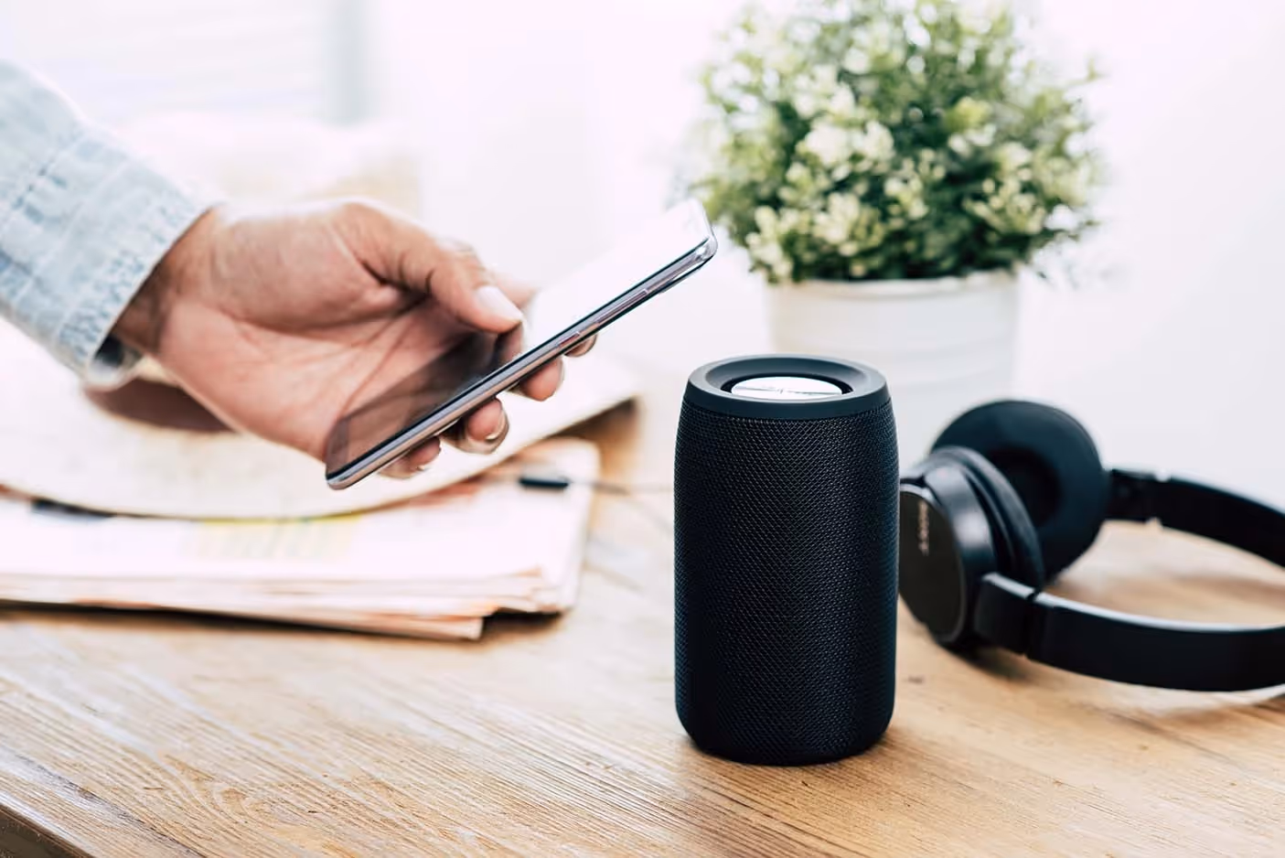 A smartphone connecting with a speaker via bluetooth