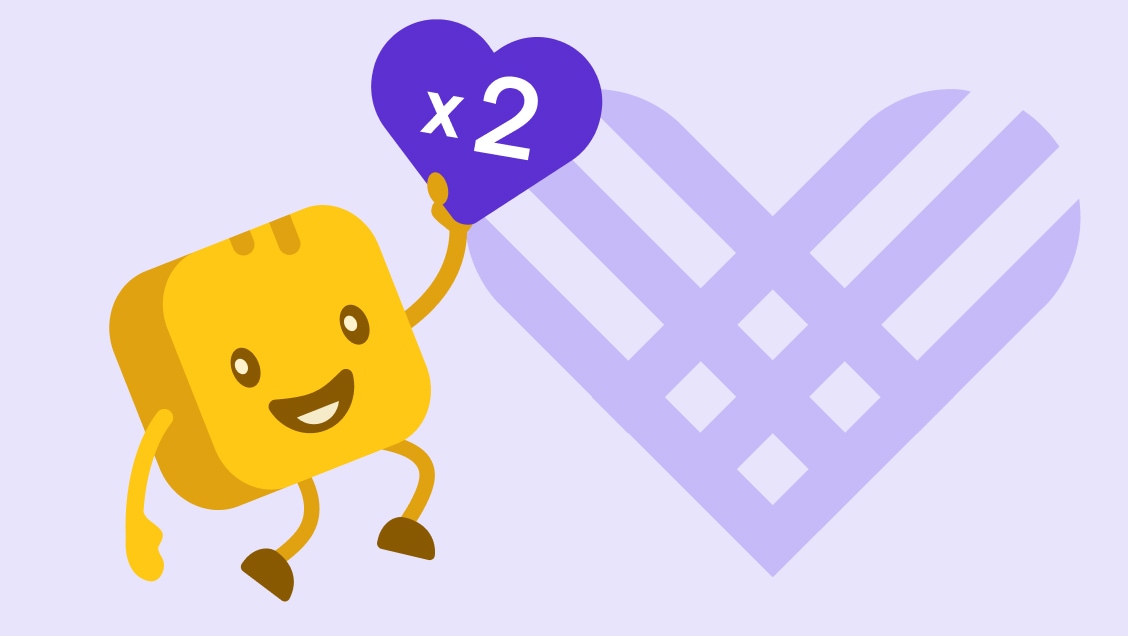 Mr Butter holding a purple giving tuesday heart