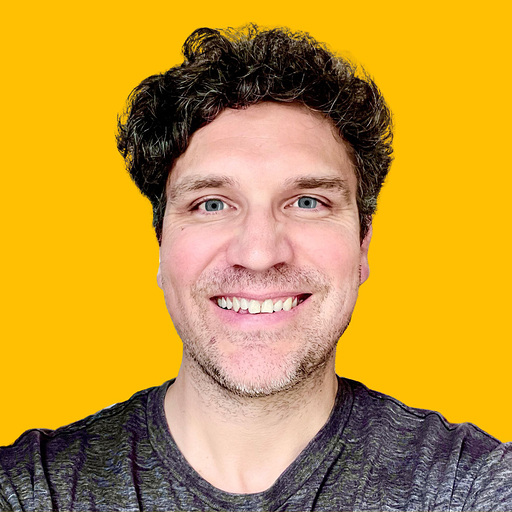 Ben's headshot against a yellow background