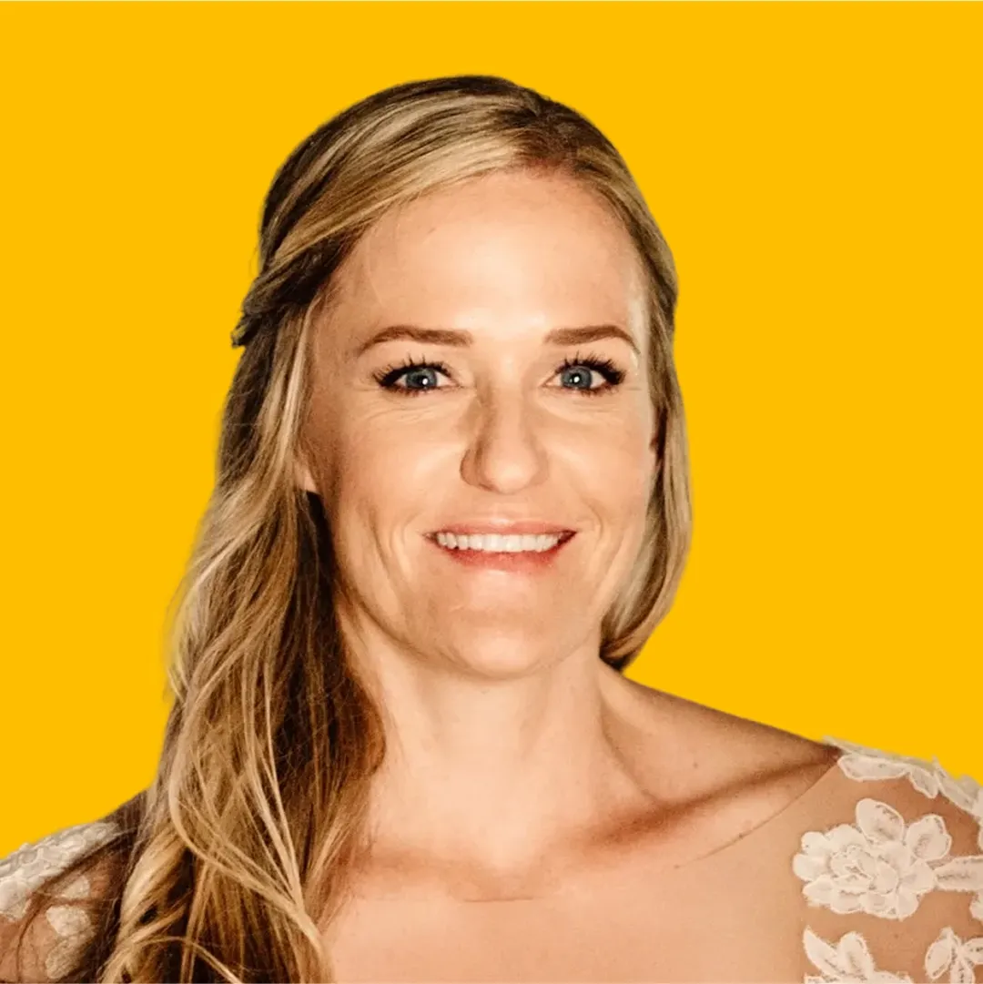 caitlin's headshot against a yellow background
