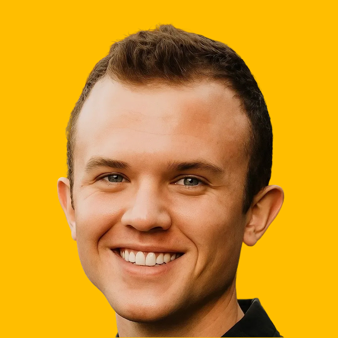 Burke's headshot against yellow background